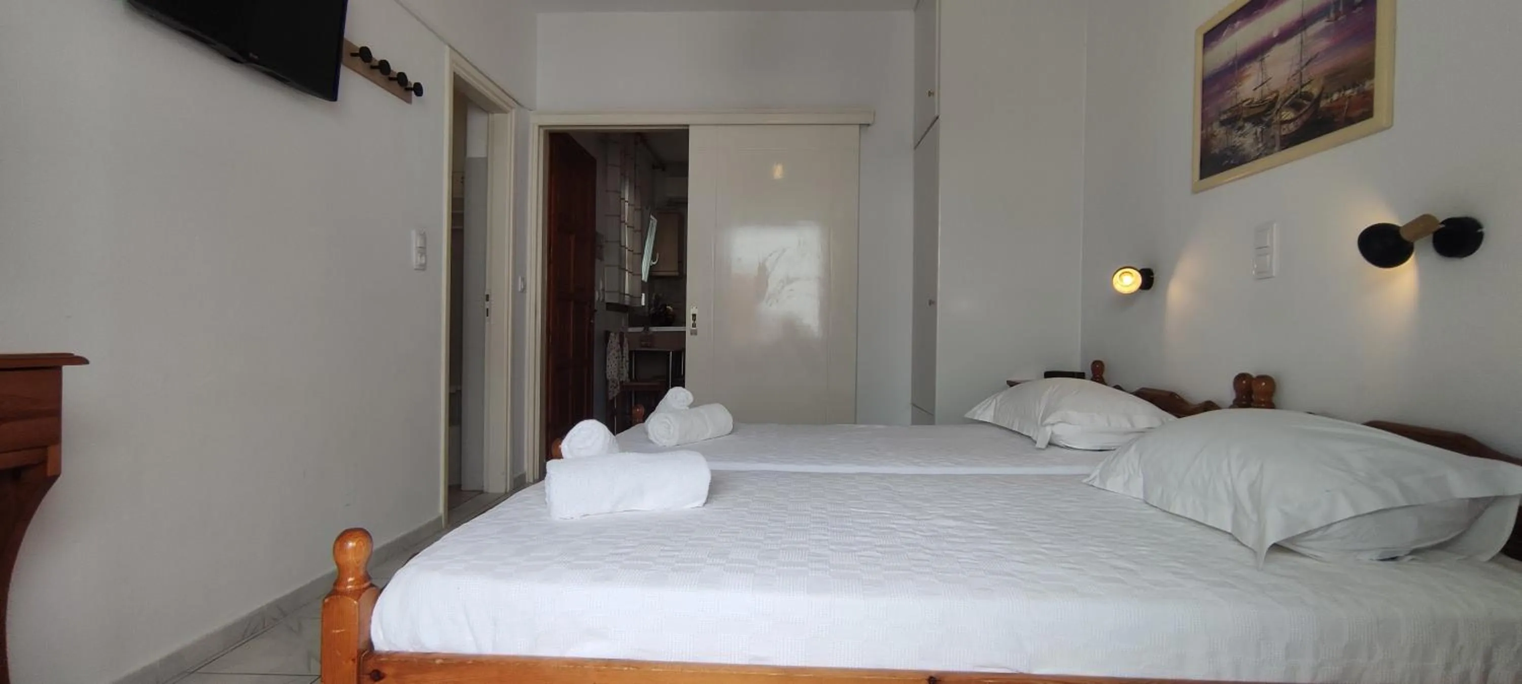 Bed in Kapetanos Rooms