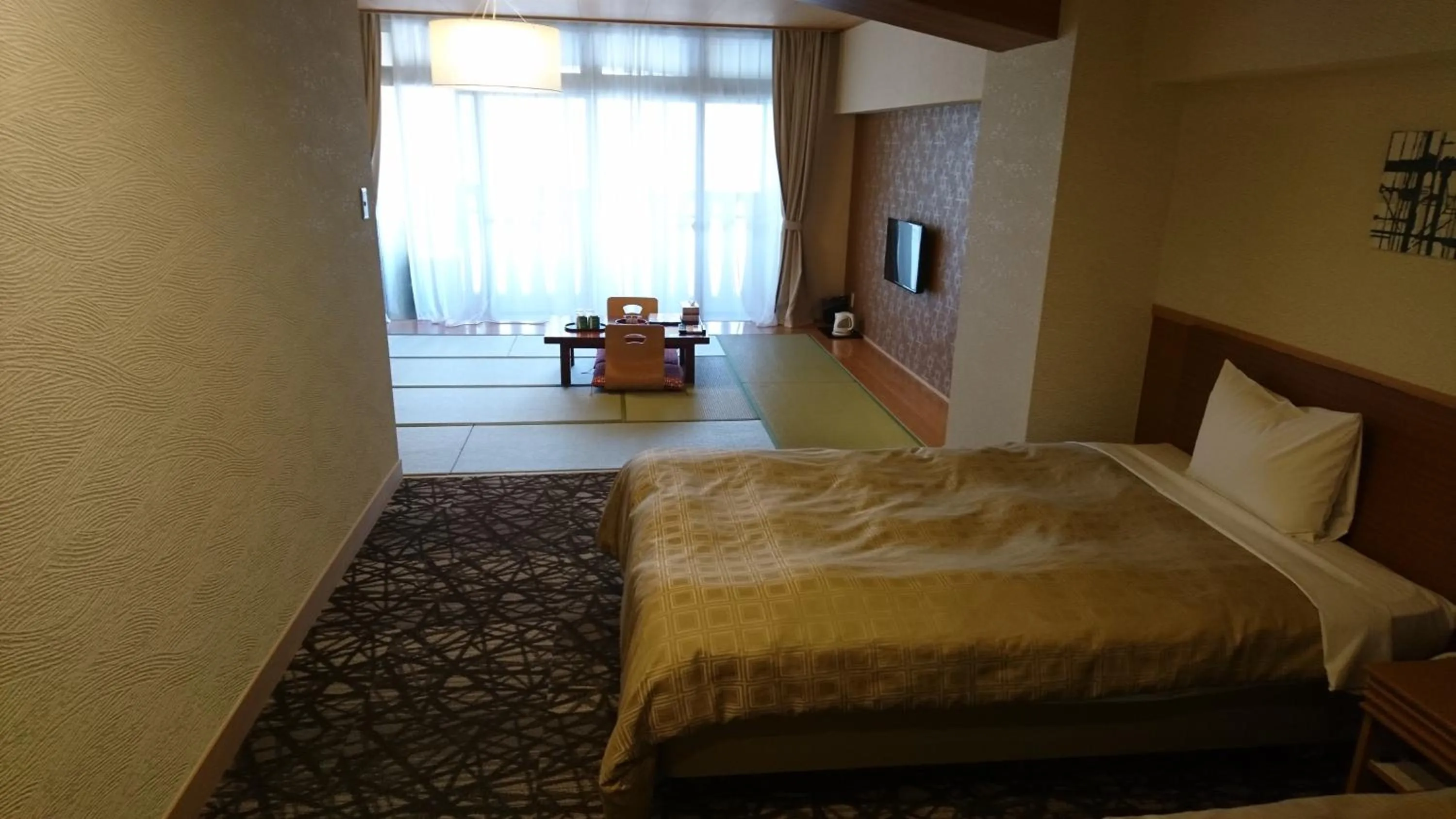 Photo of the whole room, Bed in Itoen Hotel Kusatsu