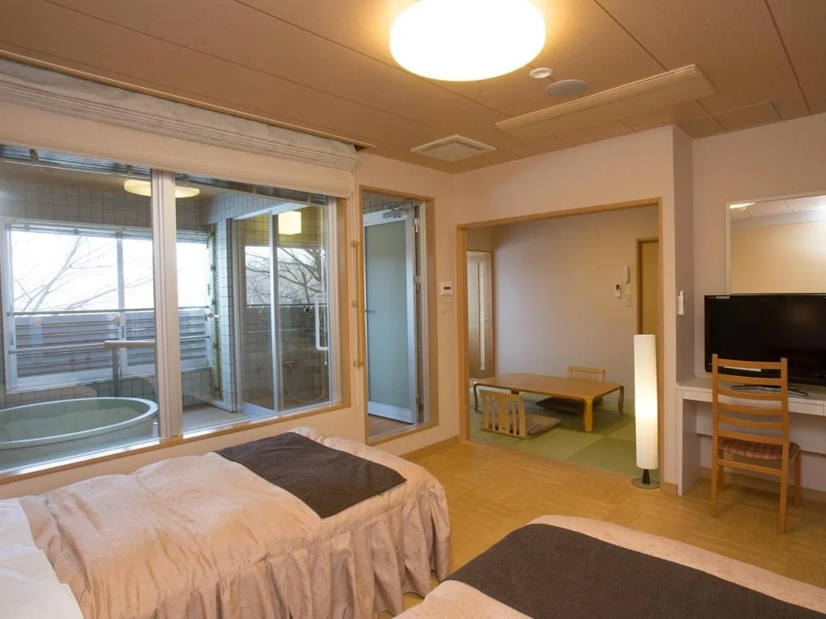 Photo of the whole room, Bed in Itoen Hotel Kusatsu