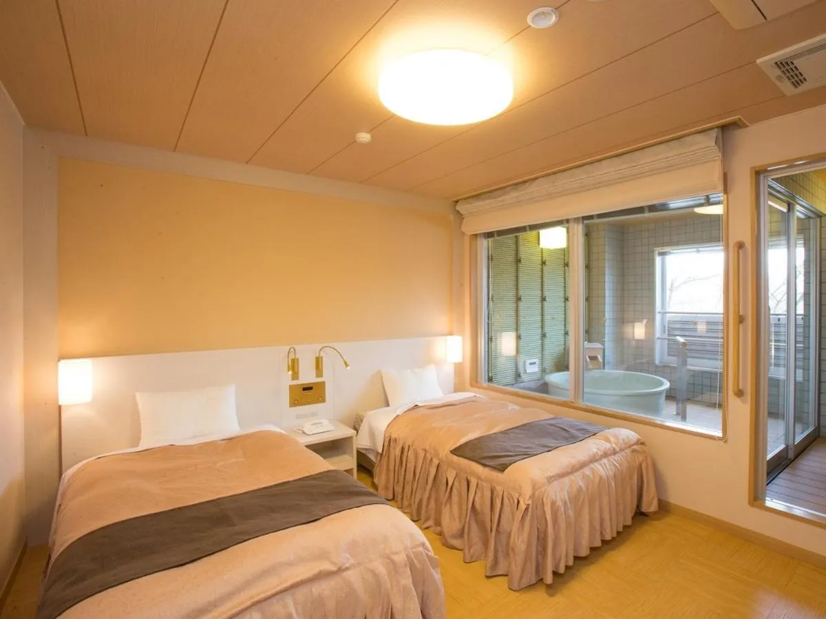 Photo of the whole room, Bed in Itoen Hotel Kusatsu