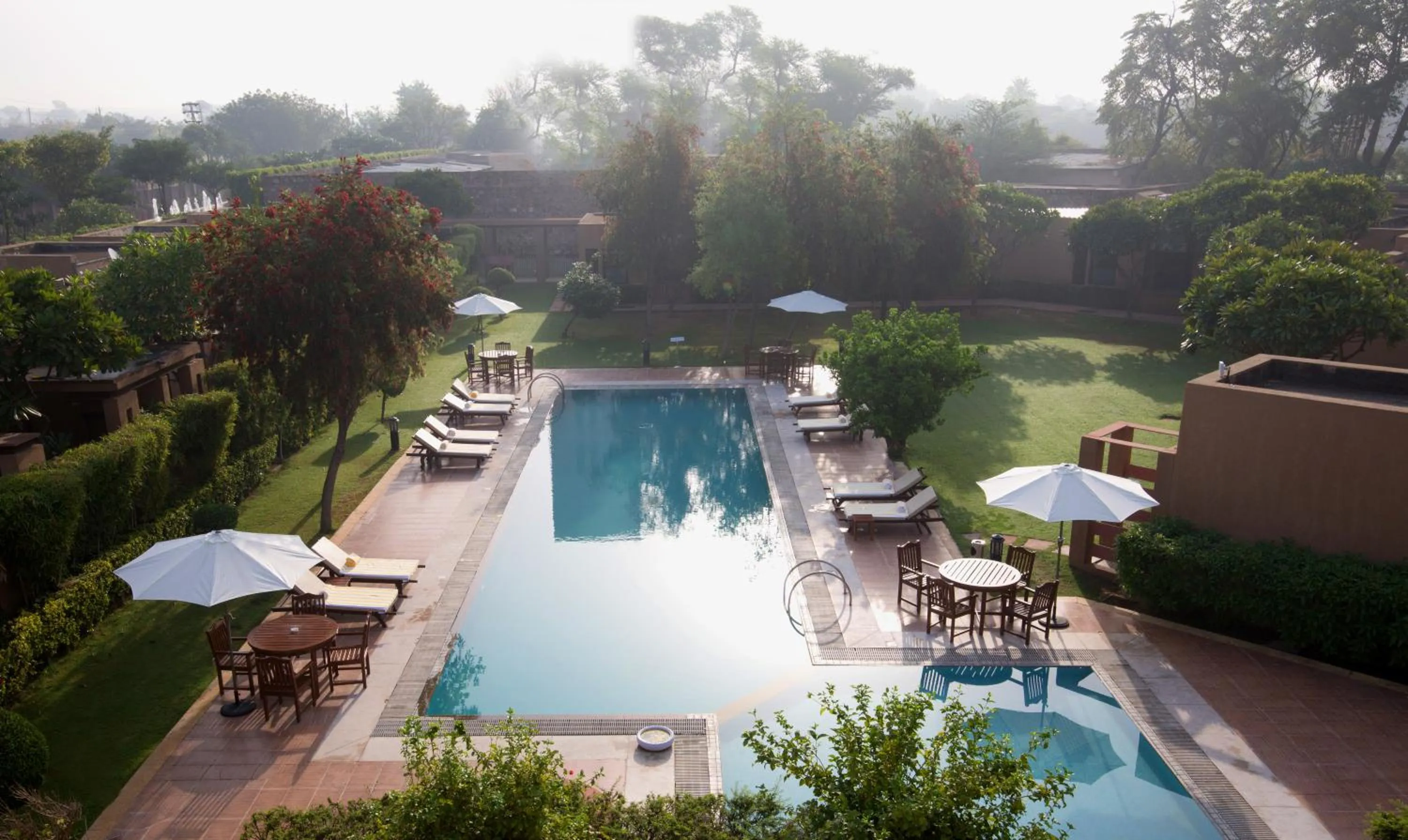 Swimming pool in Lemon Tree Hotel, Tarudhan Valley, Manesar