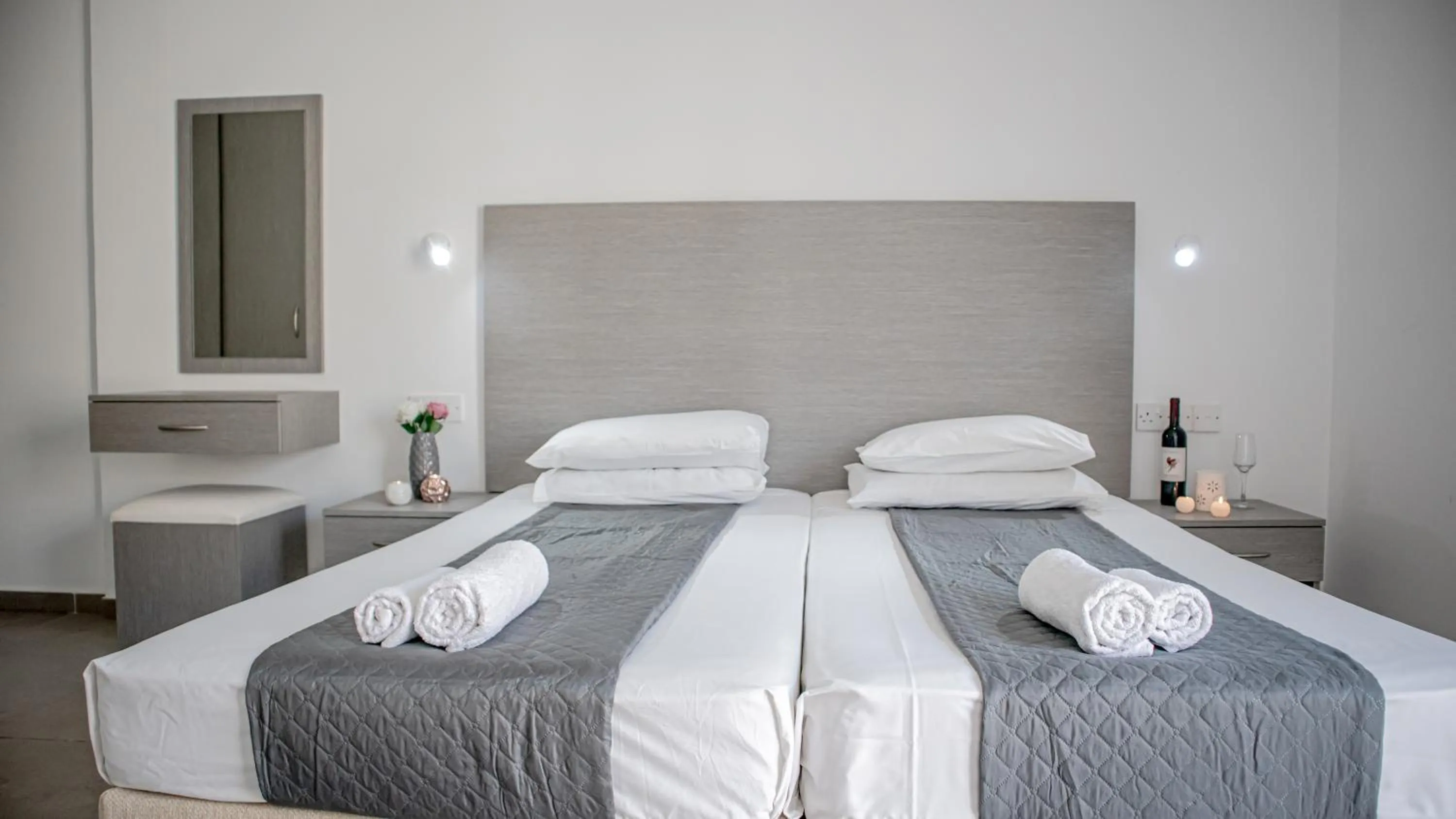 Bed in Windmills Hotel Apartments