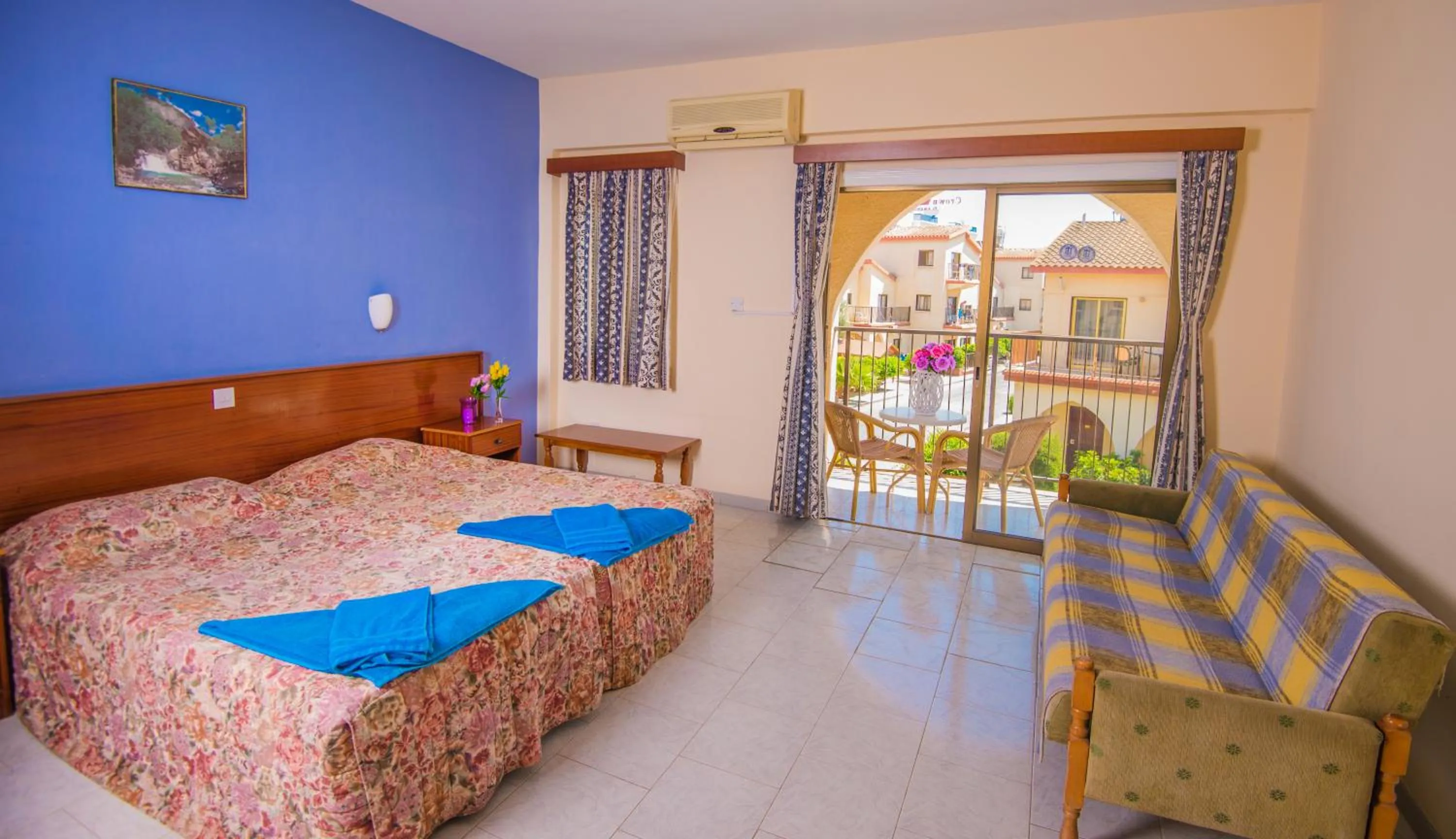 Bed in Windmills Hotel Apartments