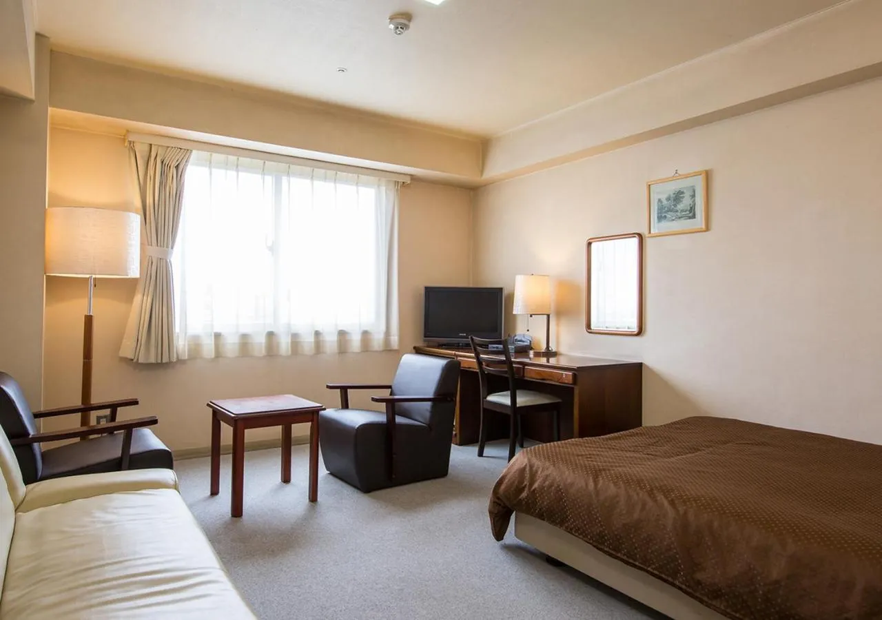 Bed in Komoro Grand Castle Hotel