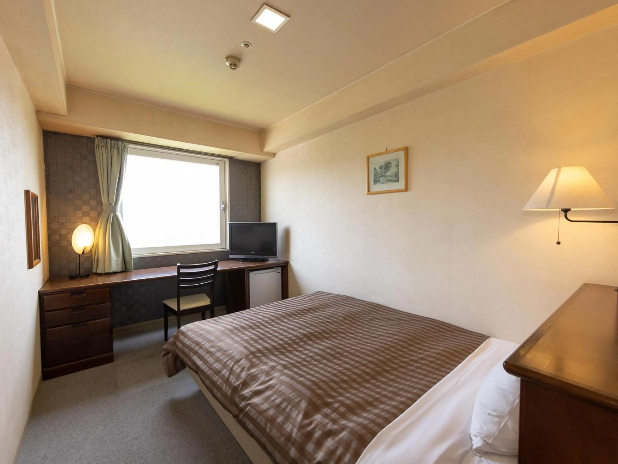 Bed in Komoro Grand Castle Hotel