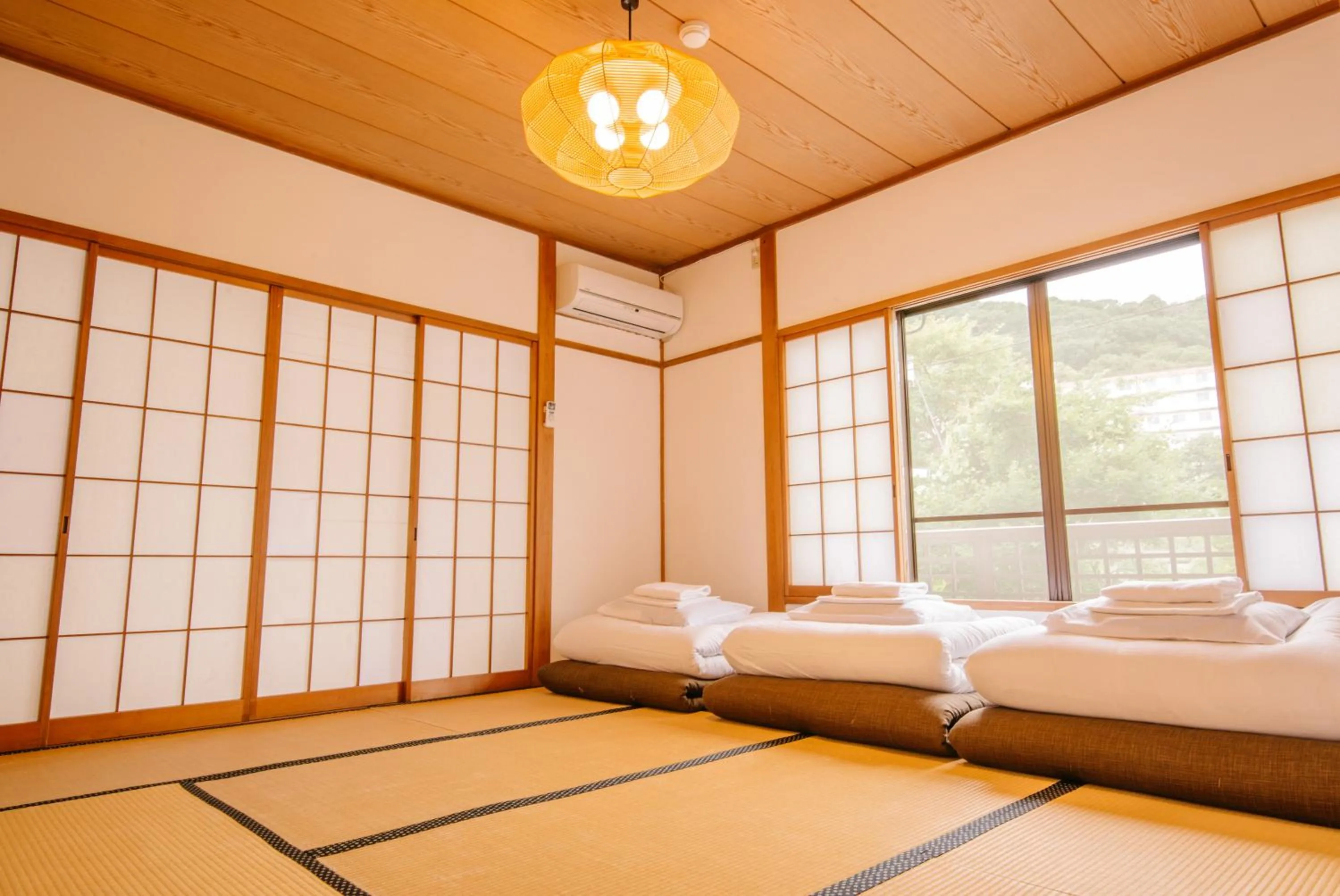 Photo of the whole room, Bed in Irori Guest House Tenmaku