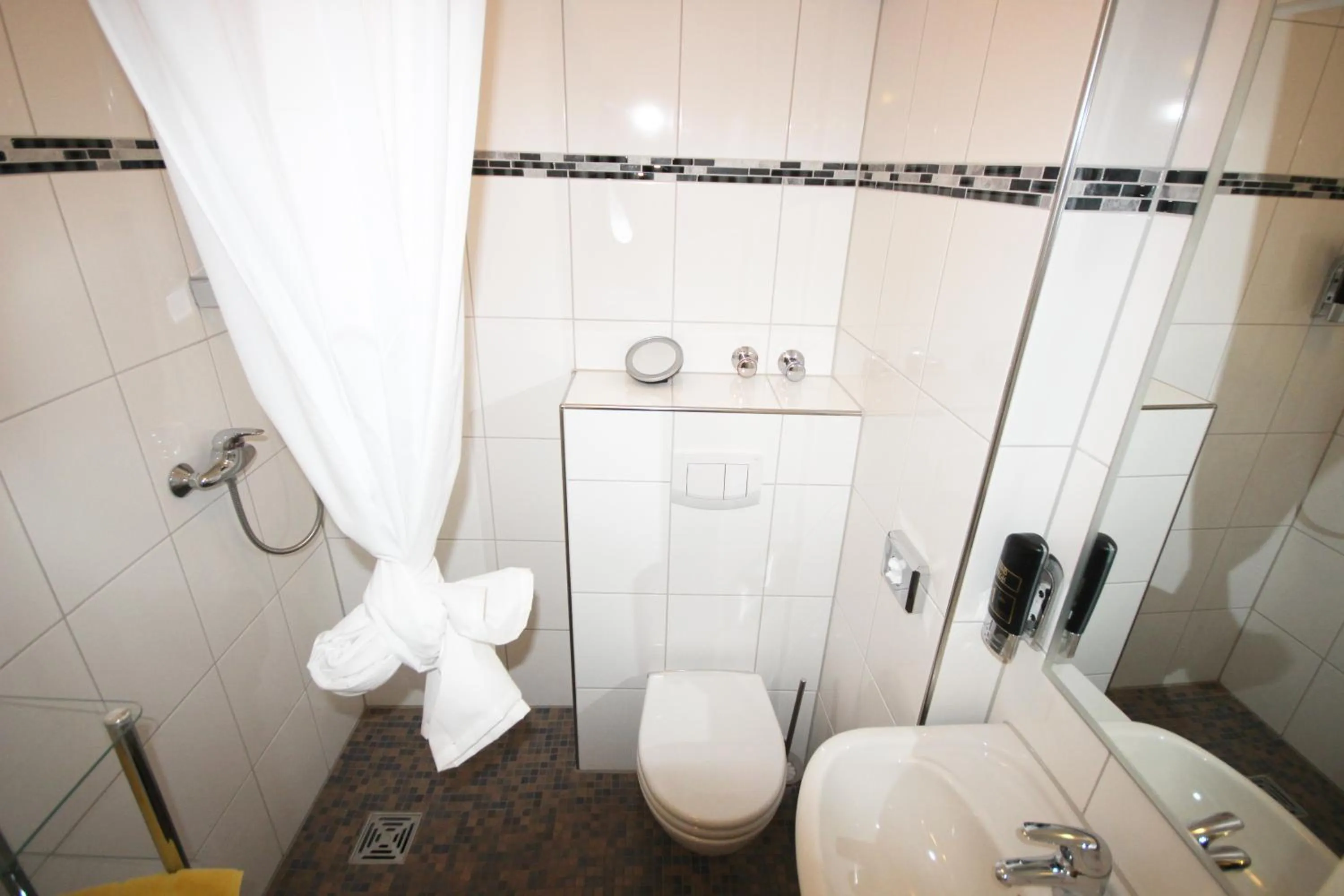 Bathroom in Aparthotel Marion Weber