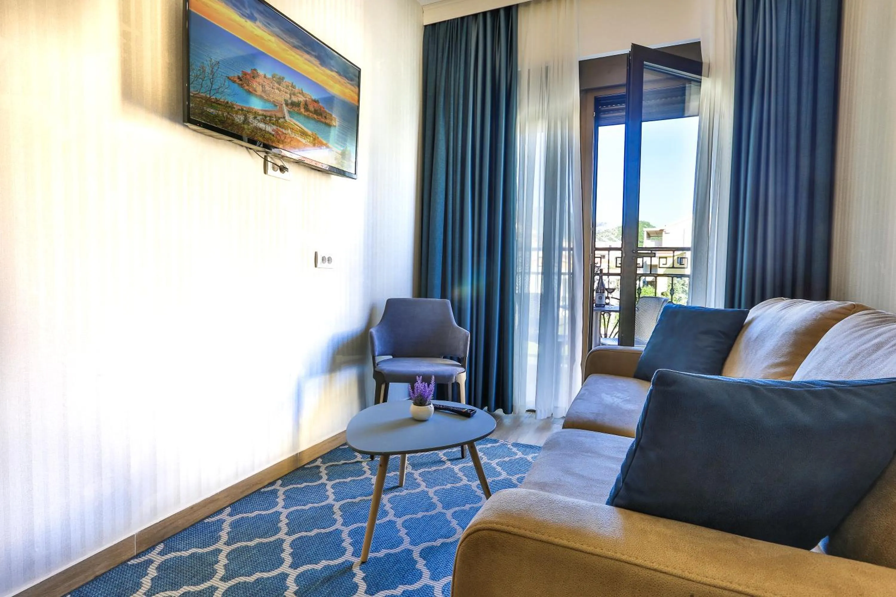 Living room in Hotel Harmony by Aycon