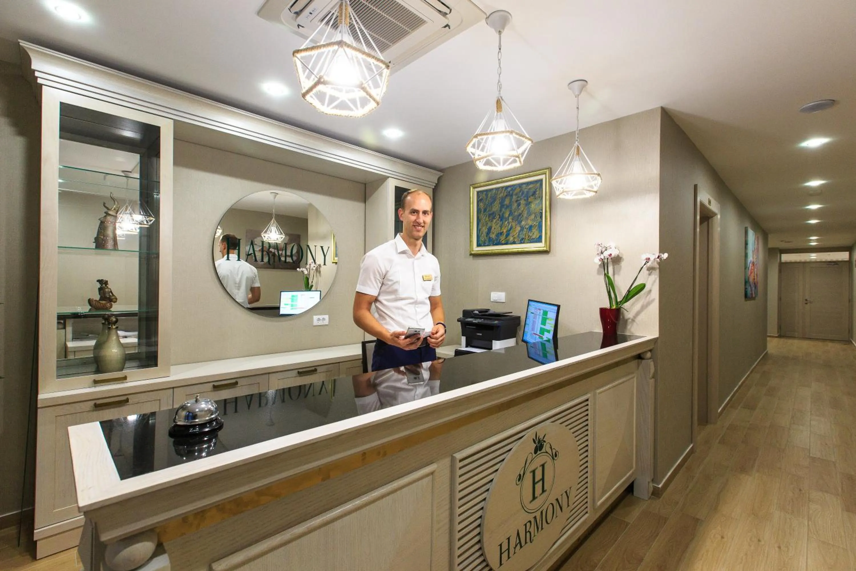 Lobby or reception in Hotel Harmony by Aycon