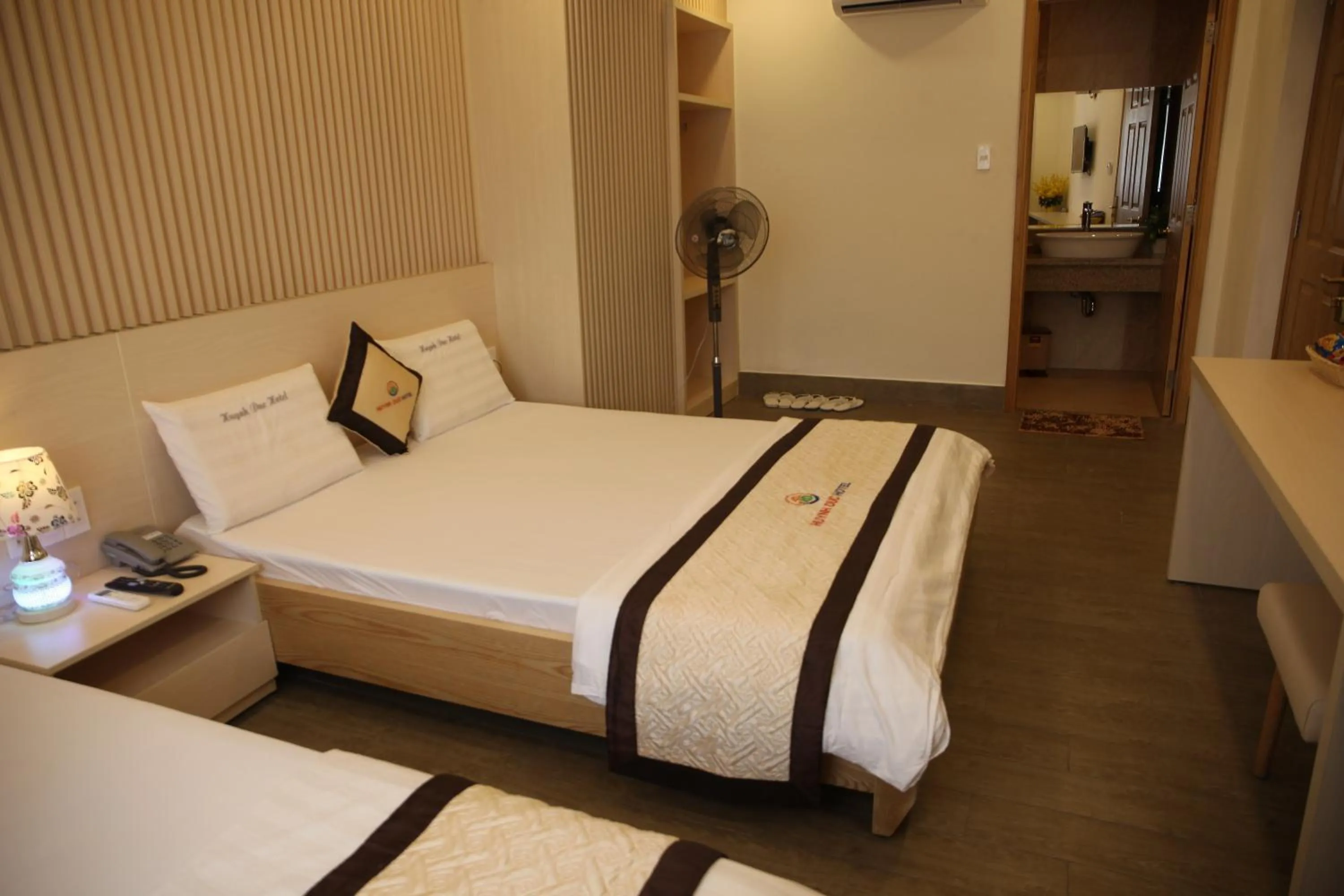 Bed in Huynh Duc 2 Hotel