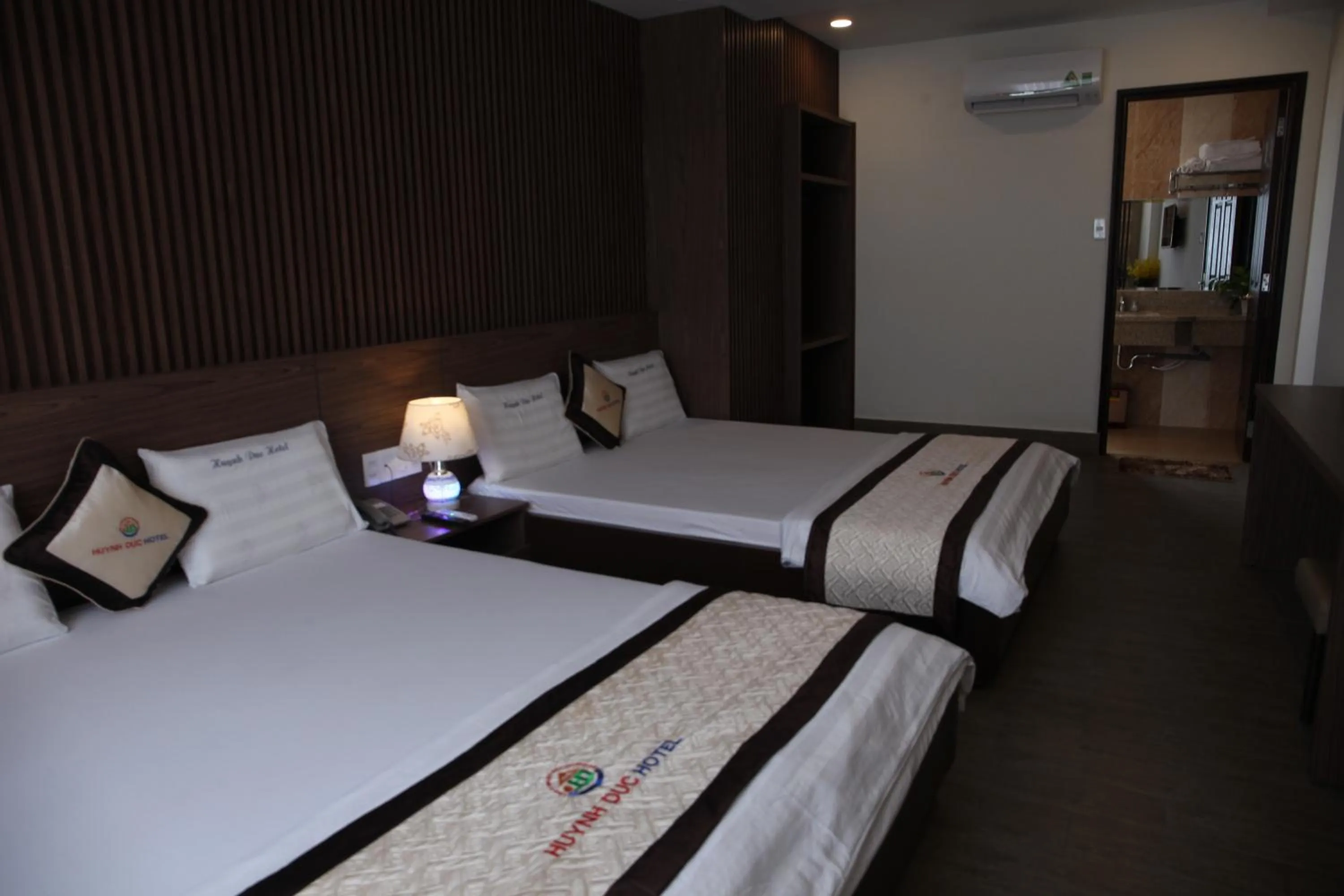 Bed in Huynh Duc 2 Hotel