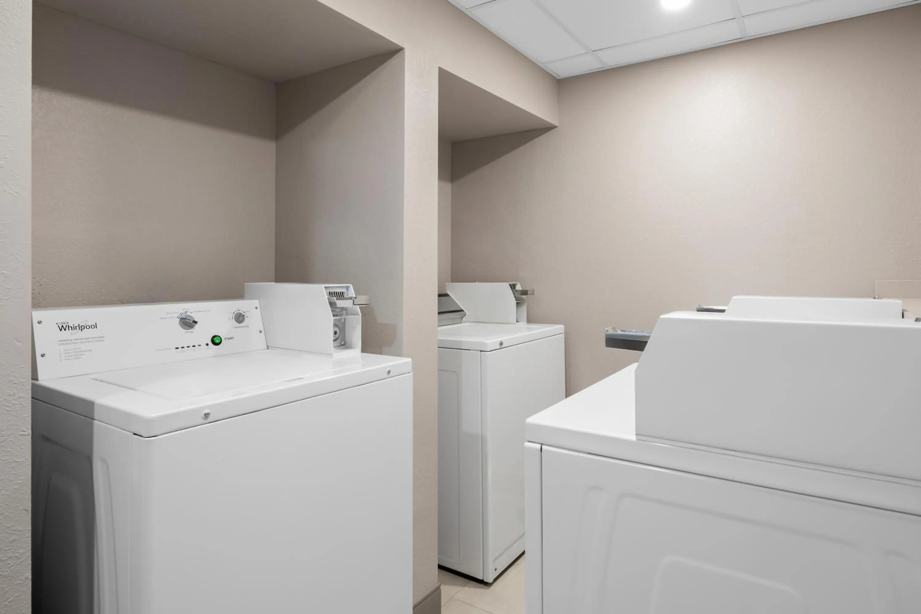 laundry in Country Inn & Suites by Radisson, Near The National Sports Center, Coon Rapids, MN