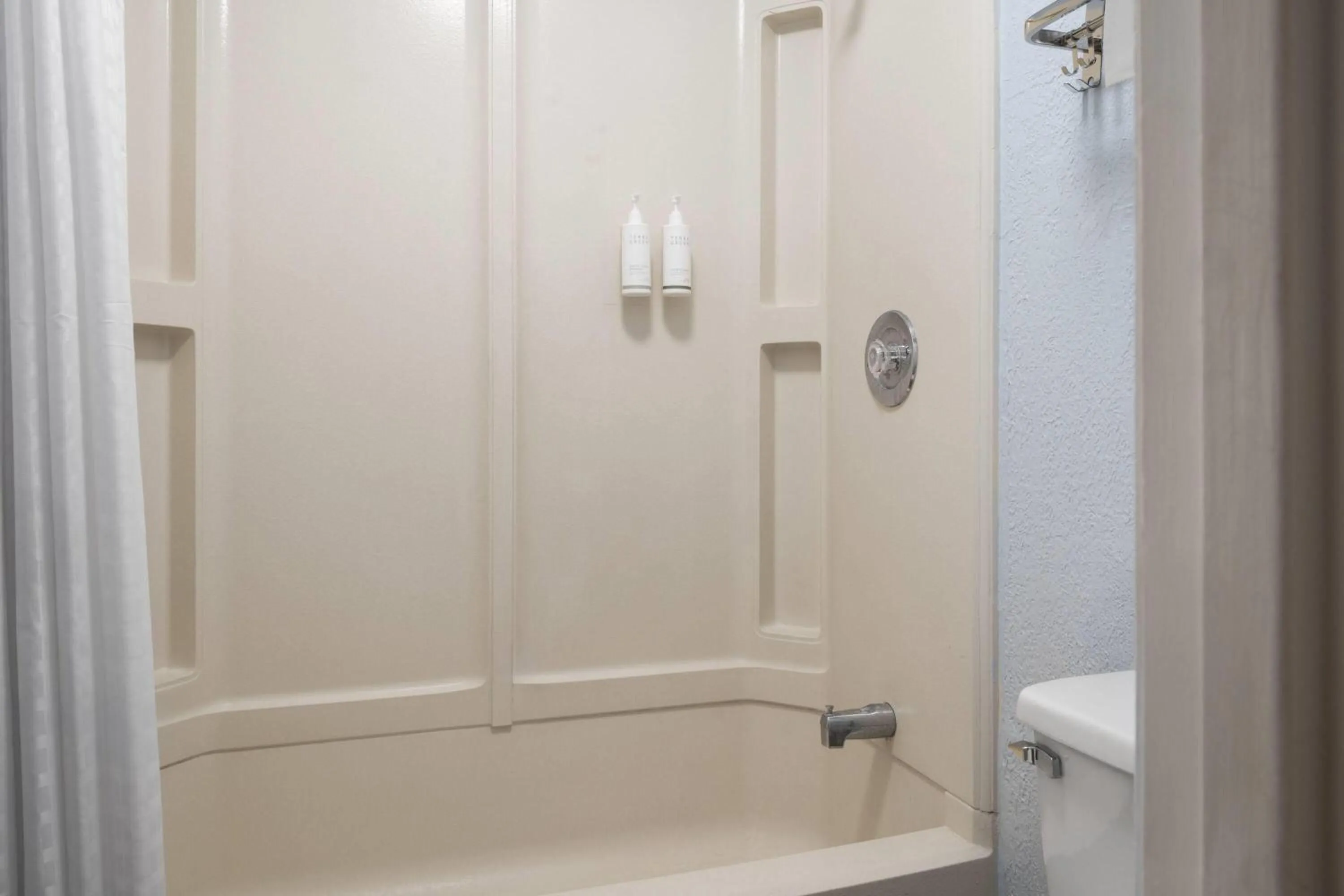 Bathroom in Days Inn by Wyndham Charlotte University