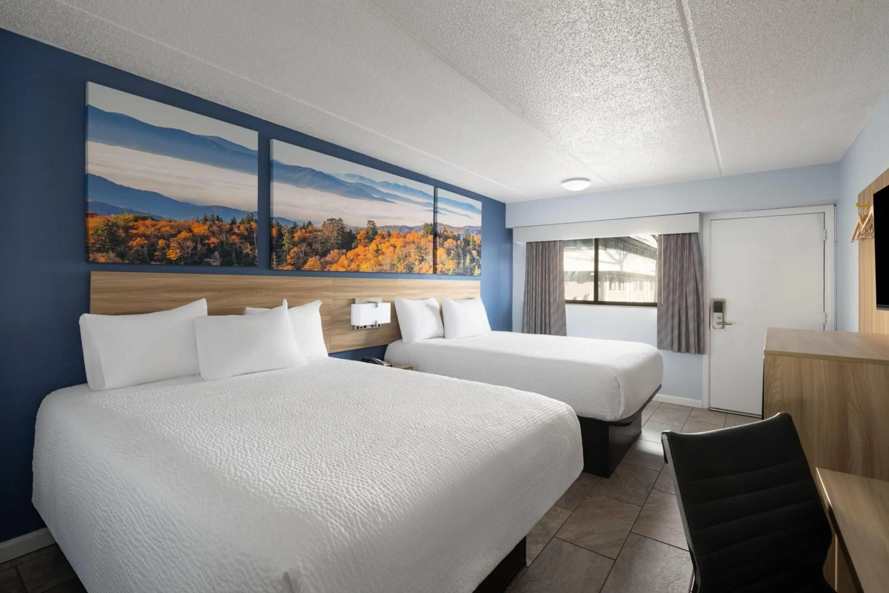 Photo of the whole room, Bed in Days Inn by Wyndham Charlotte University
