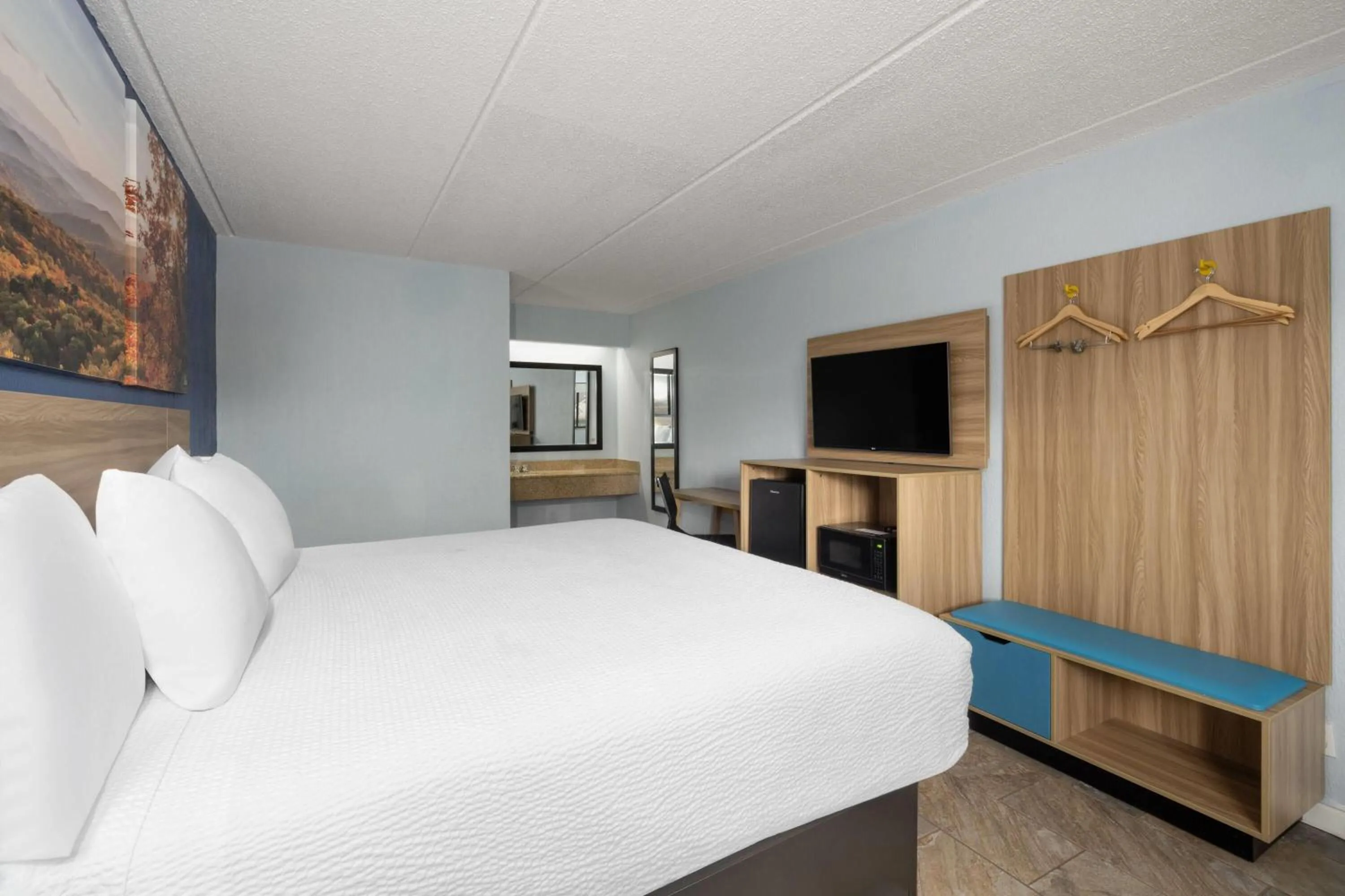 Photo of the whole room, Bed in Days Inn by Wyndham Charlotte University