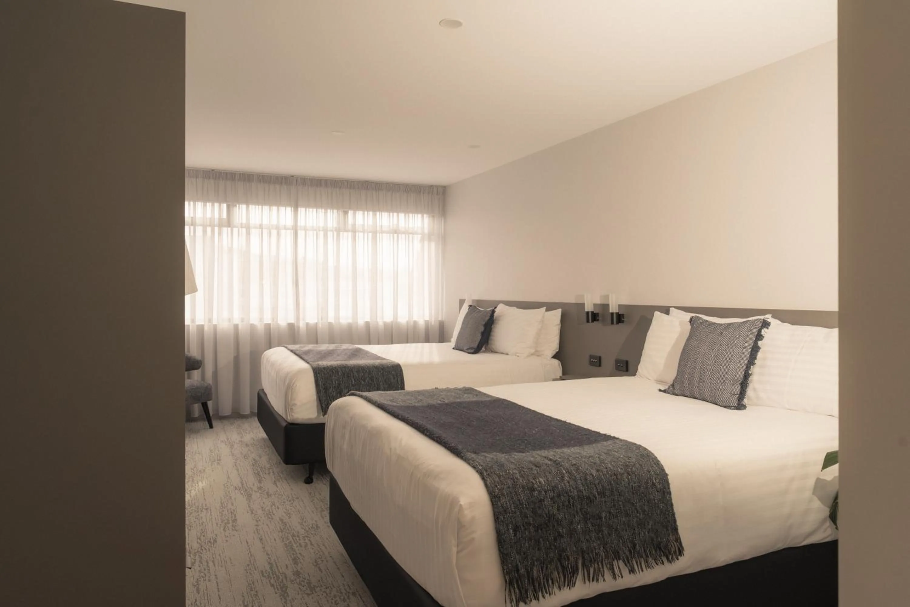 Bed in 429 Apartments & Suites