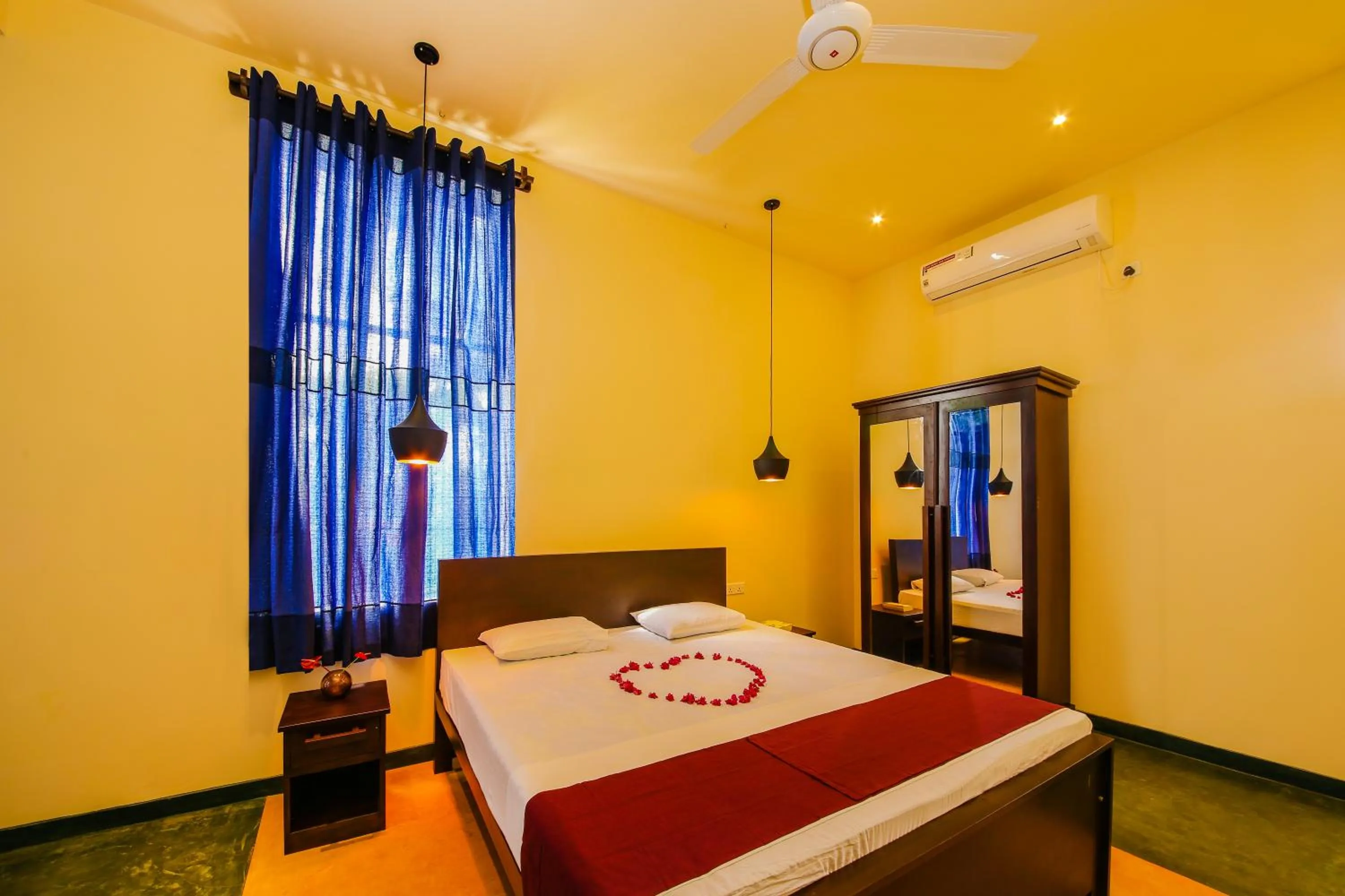 Bed in Sath Villa Naadi Ayurveda Resort