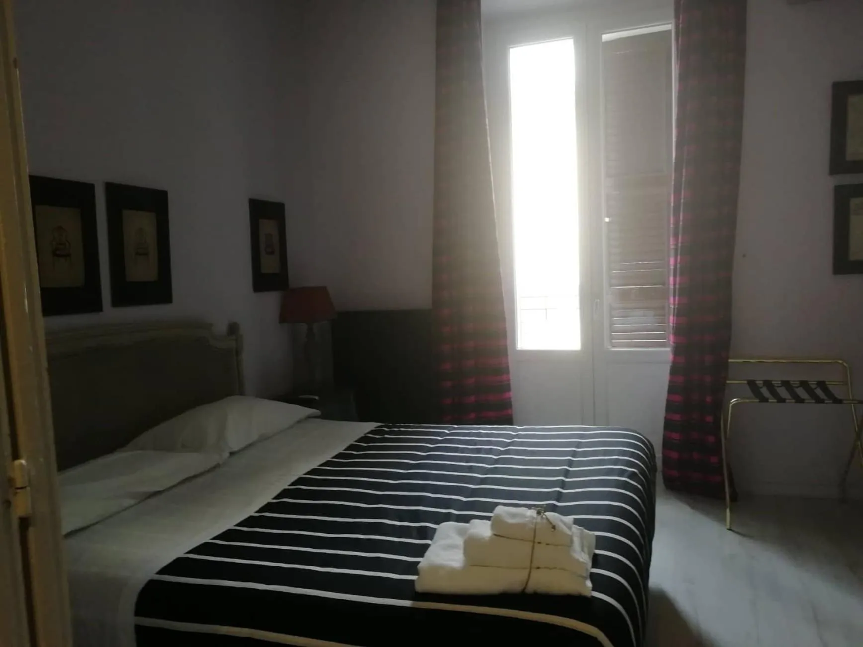 Bedroom in Gatto Bianco Casa Dei Venti