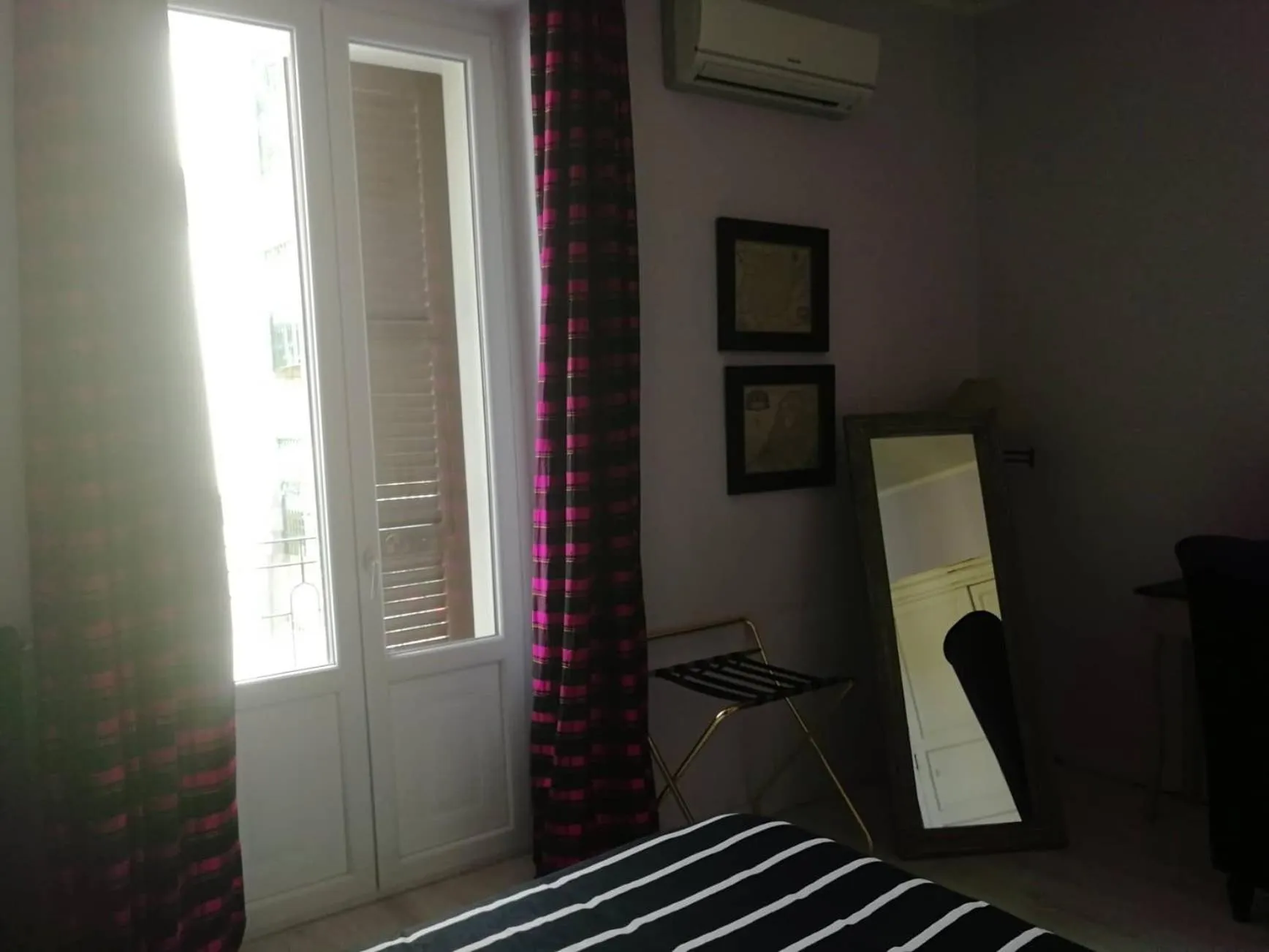 Bedroom in Gatto Bianco Casa Dei Venti