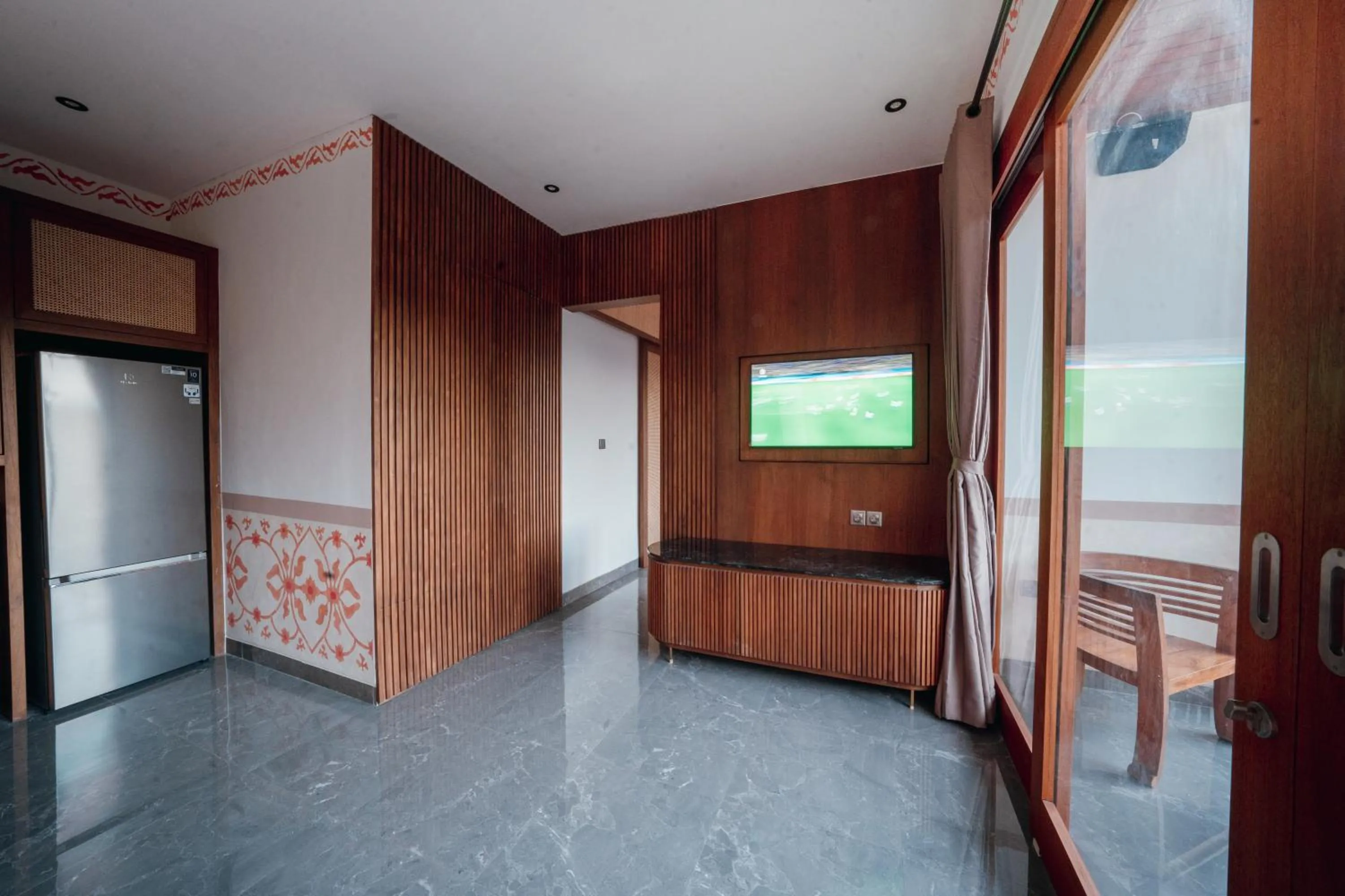 Communal lounge/ TV room in Jero Griya Ubud