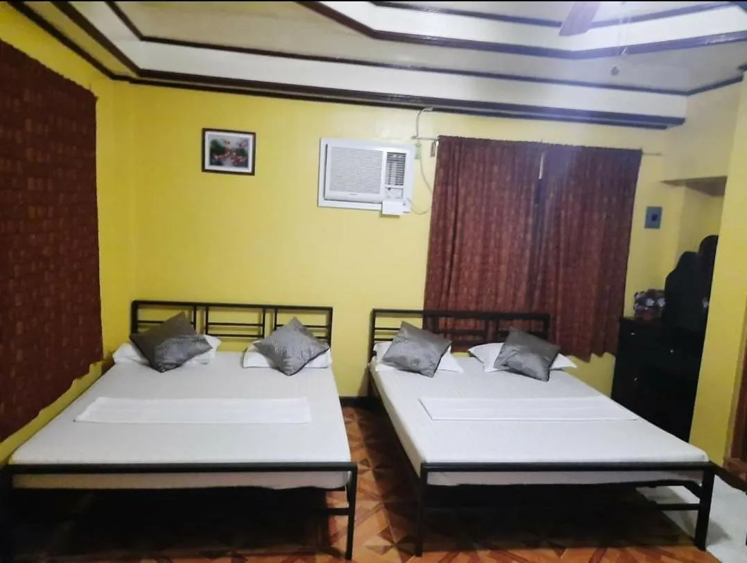 Bed in Carribean Transient House