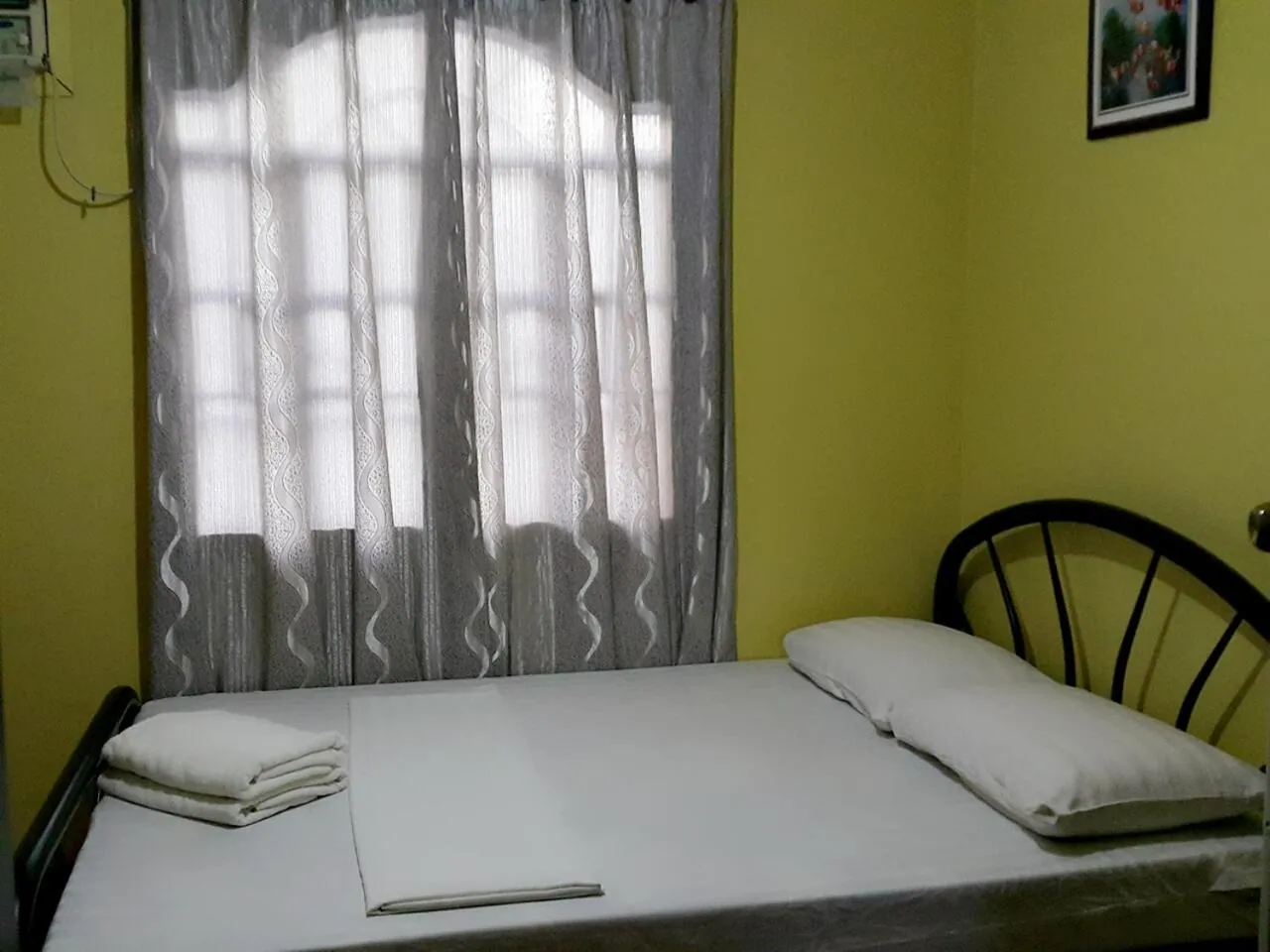 Bed in Carribean Transient House