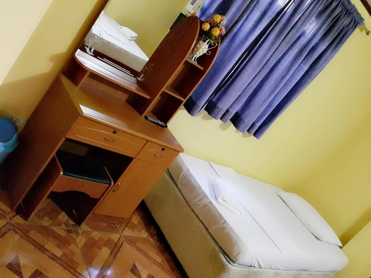 Bed in Carribean Transient House