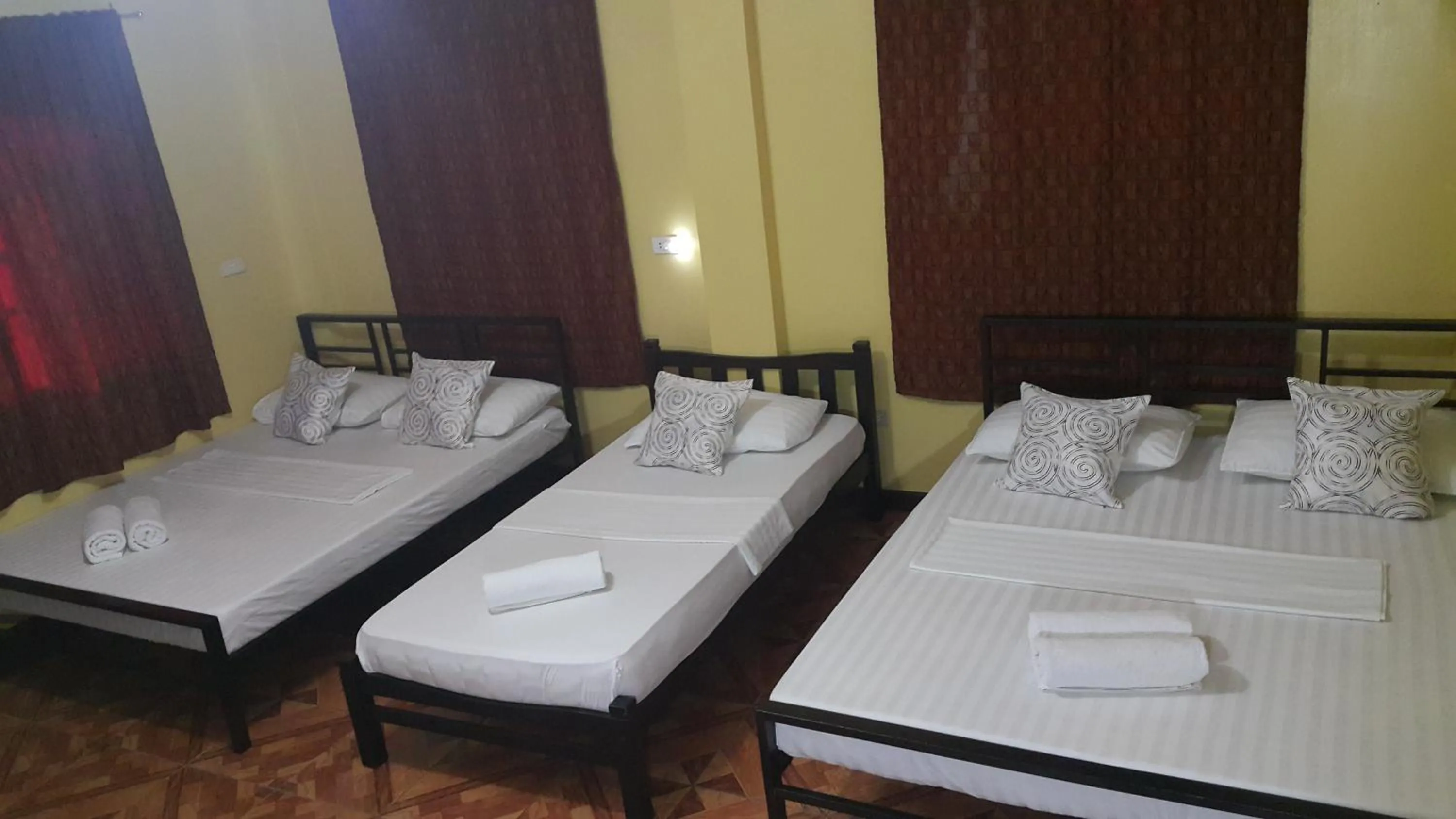 Bed in Carribean Transient House