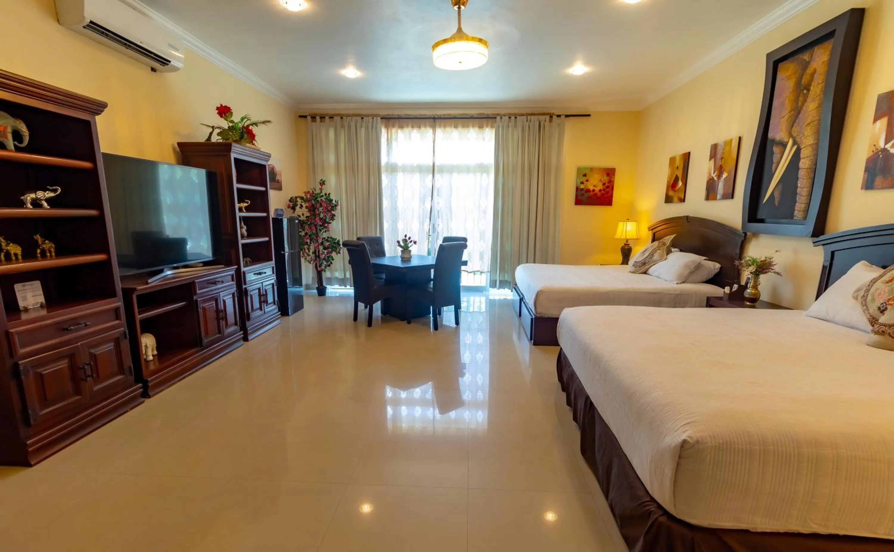 Photo of the whole room, Bed in Villa Segovia Cozumel