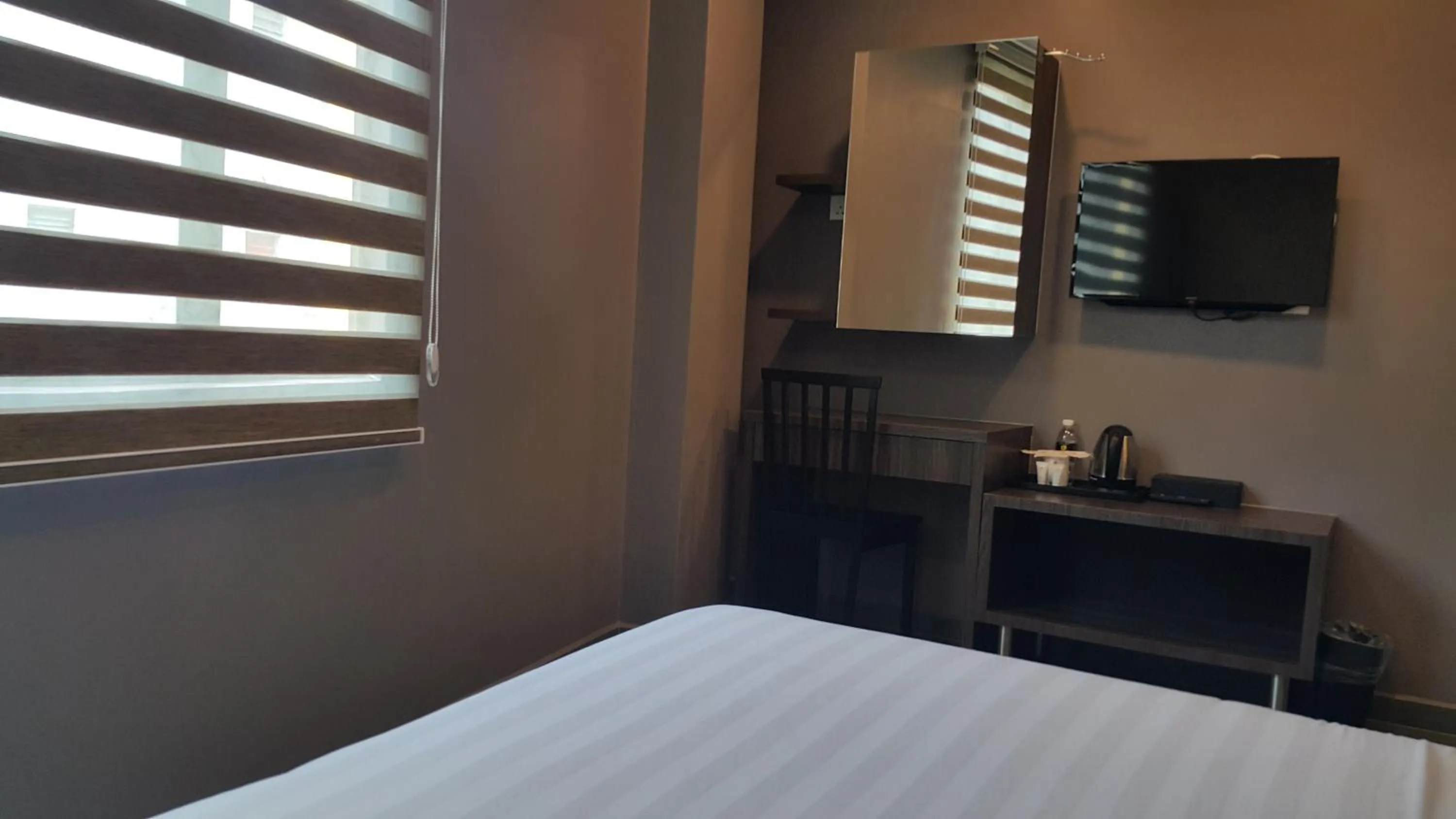 Bed in Kampar Boutique Hotel