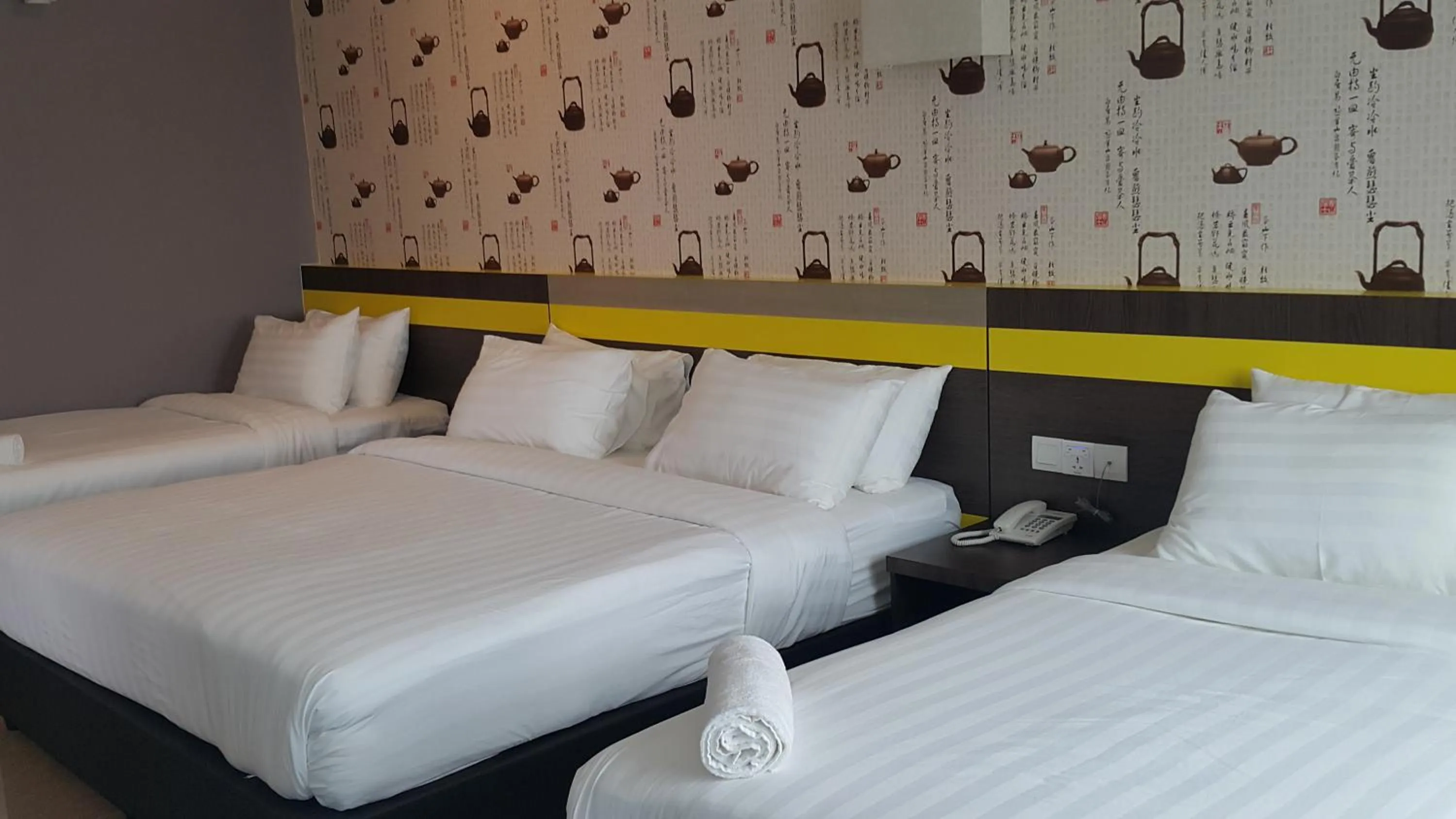 Bed in Kampar Boutique Hotel