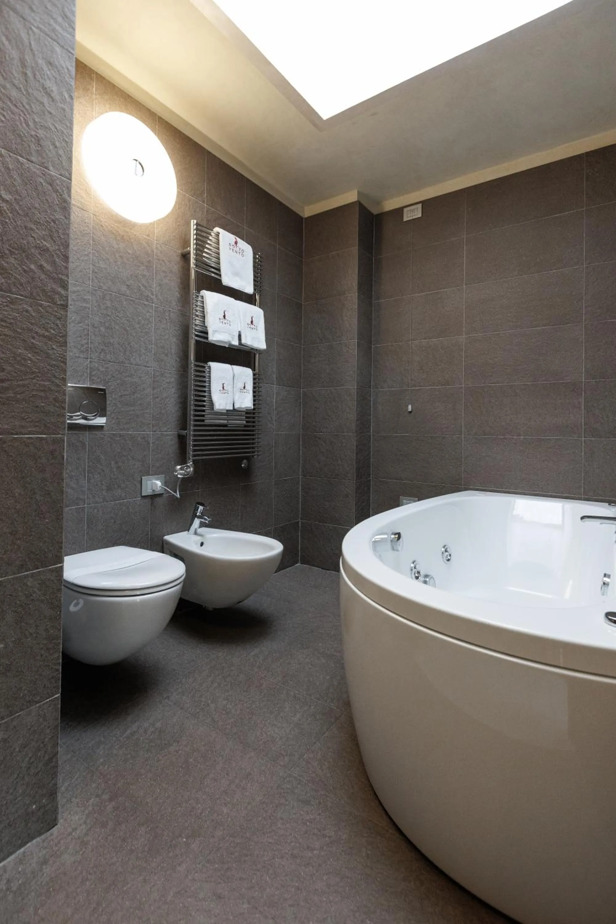 Toilet in Sottovento Luxury Hospitality