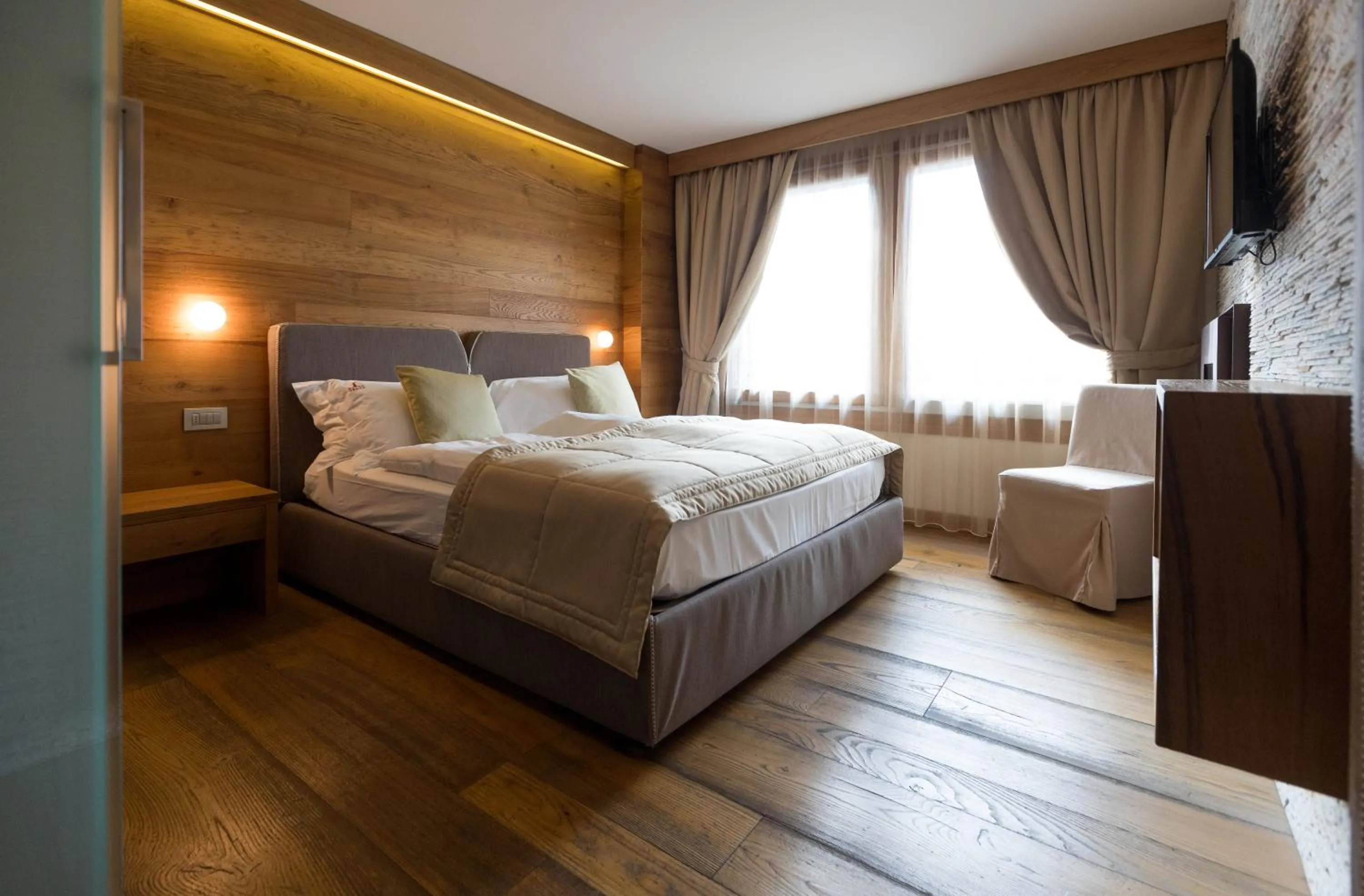 Bed in Sottovento Luxury Hospitality