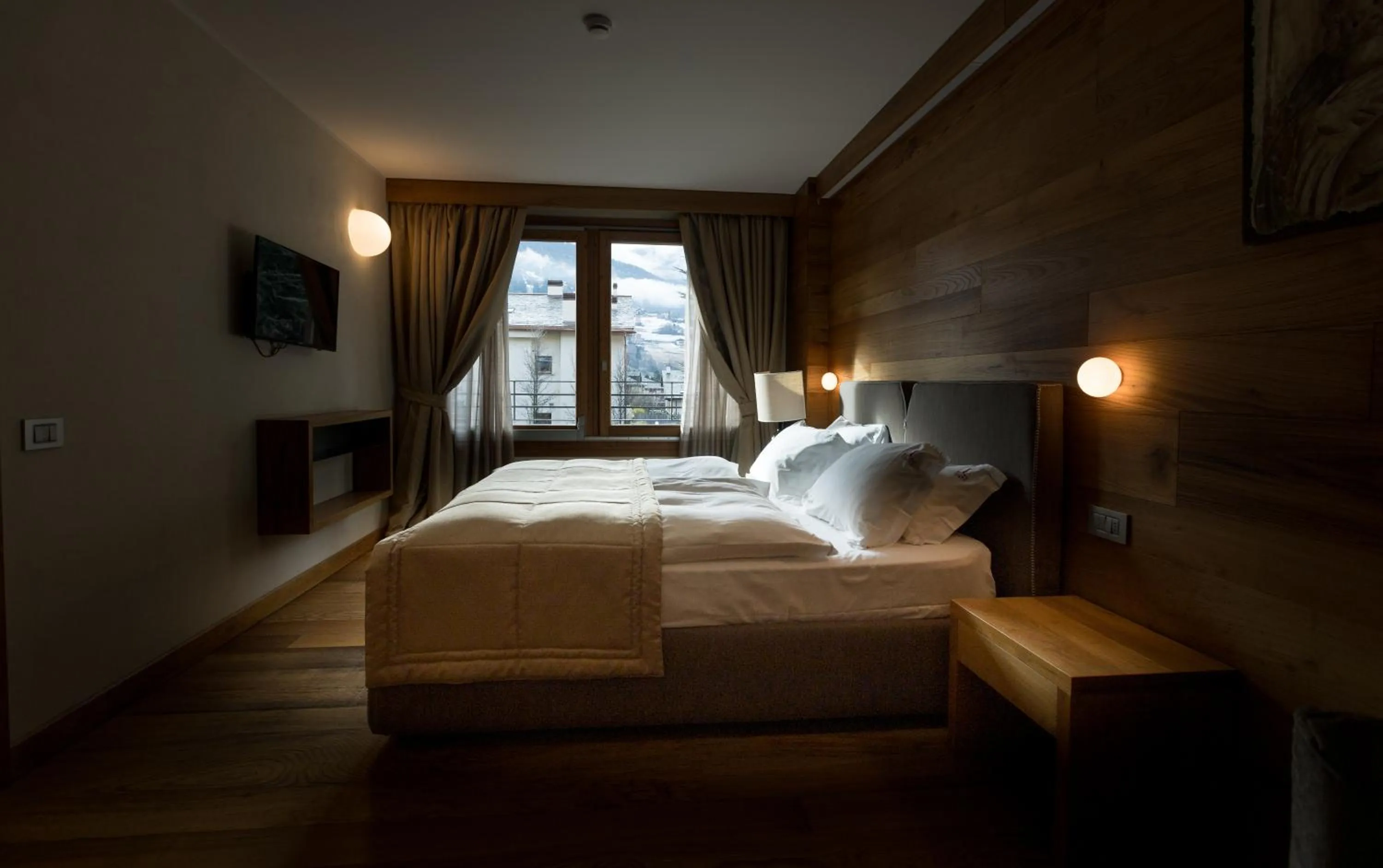 Bed in Sottovento Luxury Hospitality