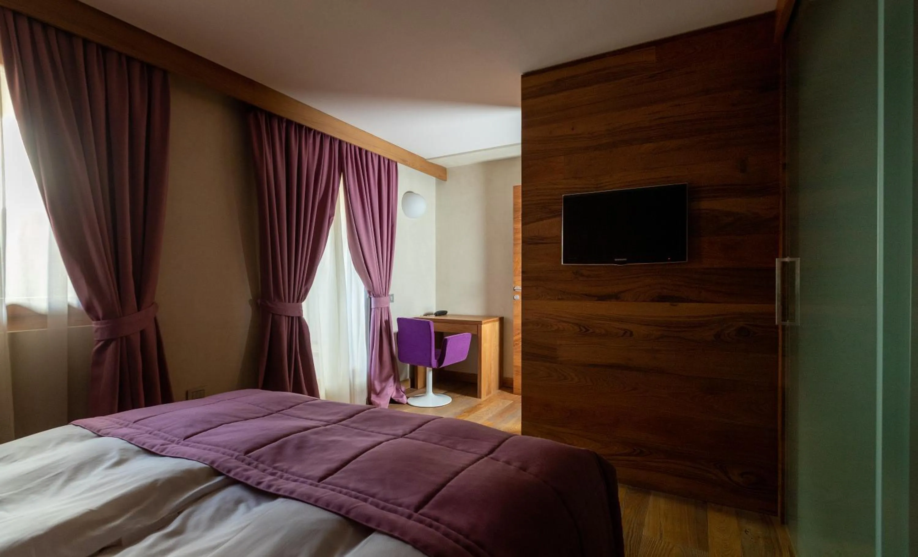 Bed in Sottovento Luxury Hospitality