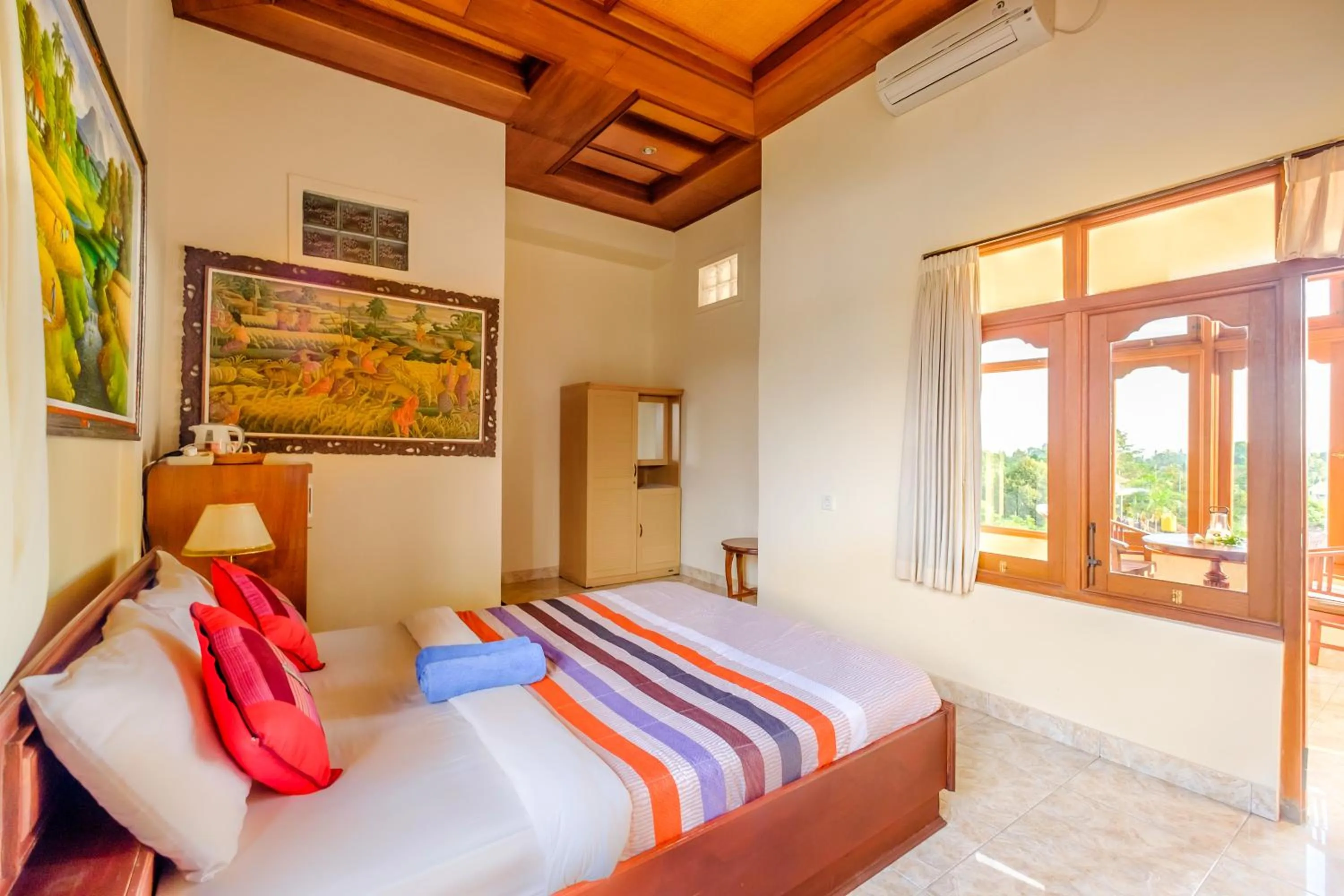 Bed in Bali Spring Cottages