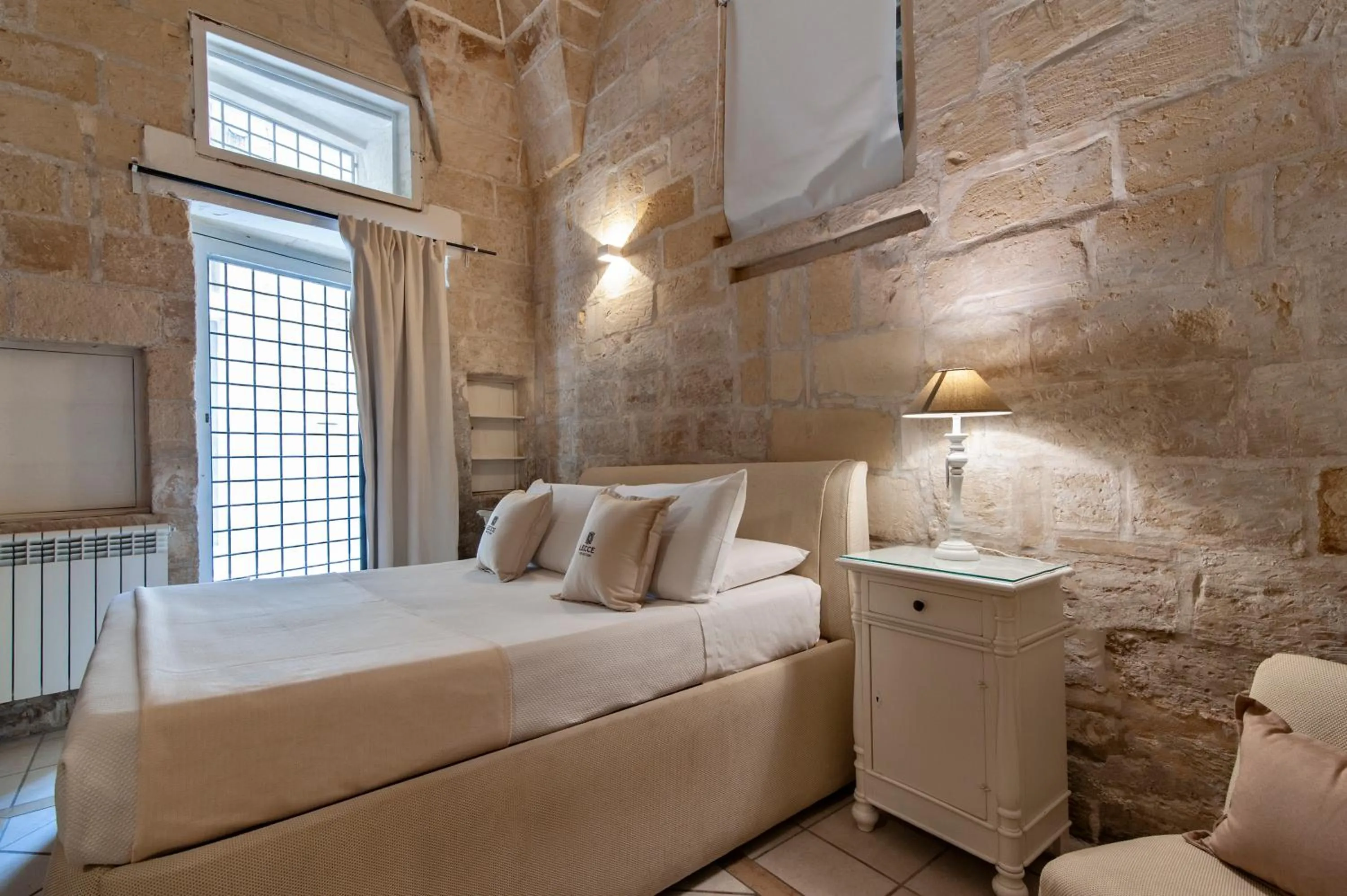 Photo of the whole room, Bed in Chiesa Greca Suites - Lecce Selection