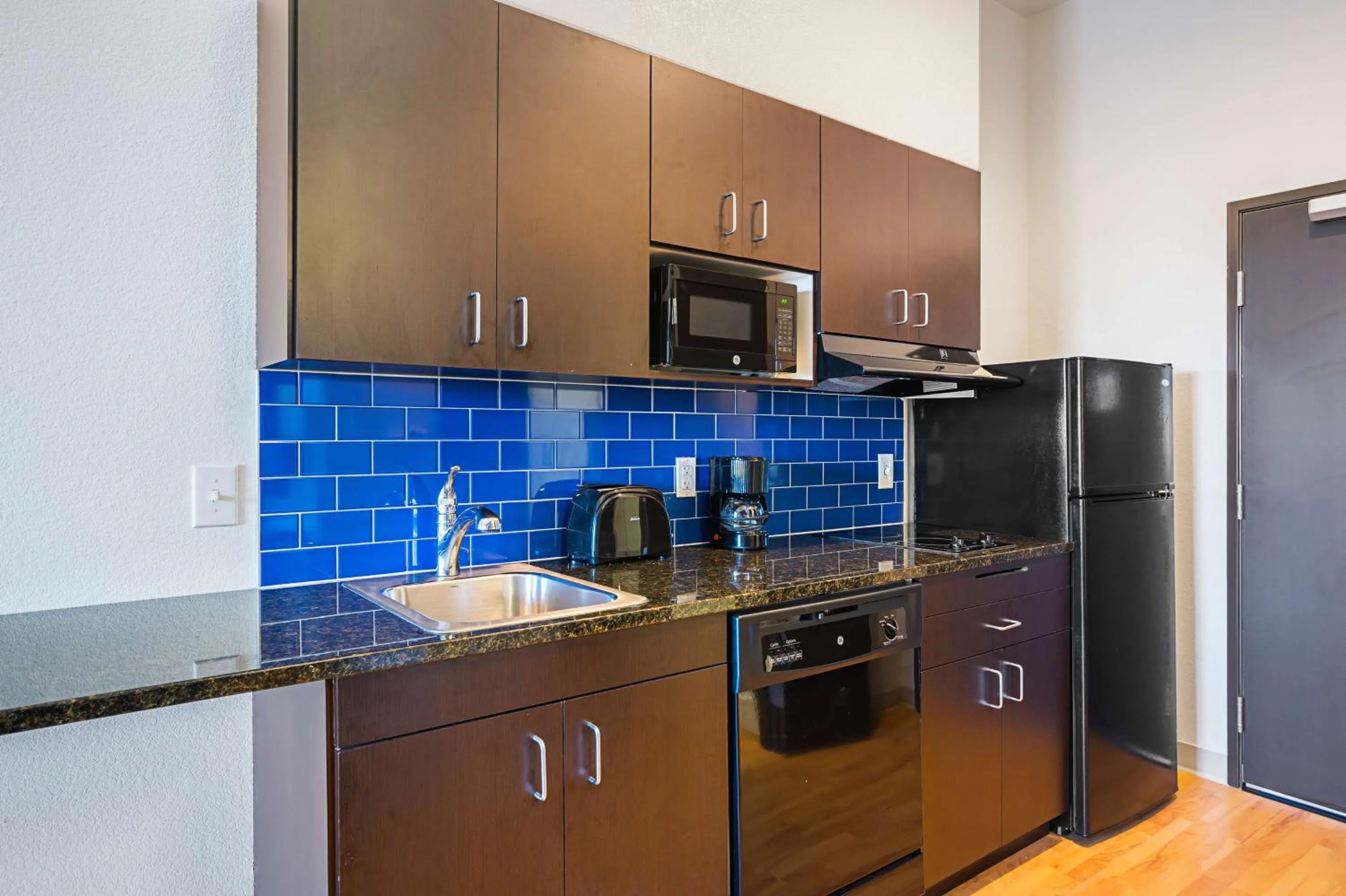 Kitchen or kitchenette in Studio 6-Buda, TX