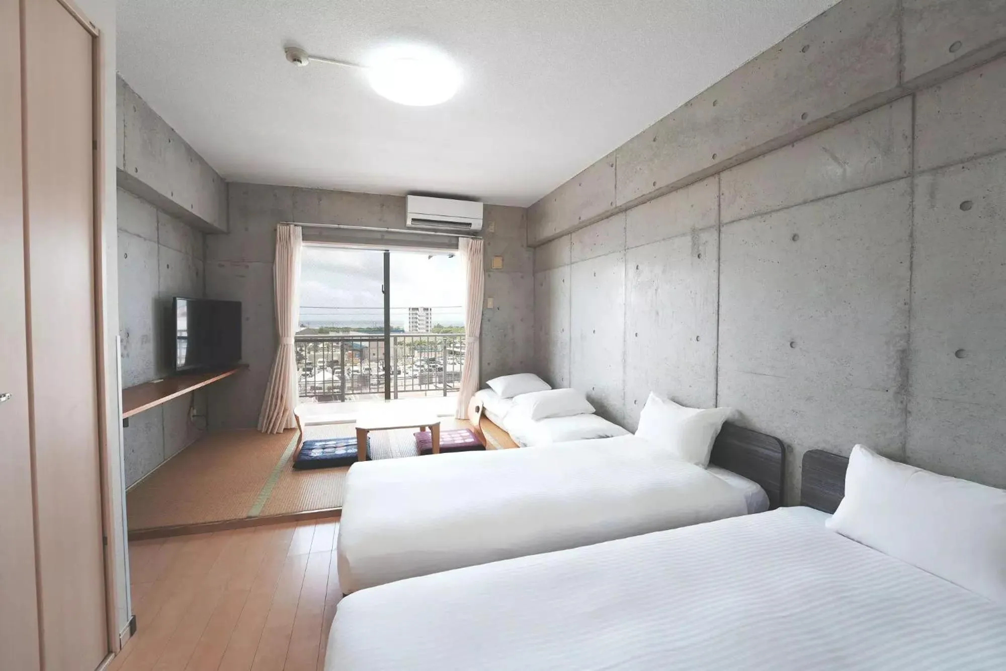 Photo of the whole room, Bed in Hotel Resort Inn Ishigakijima