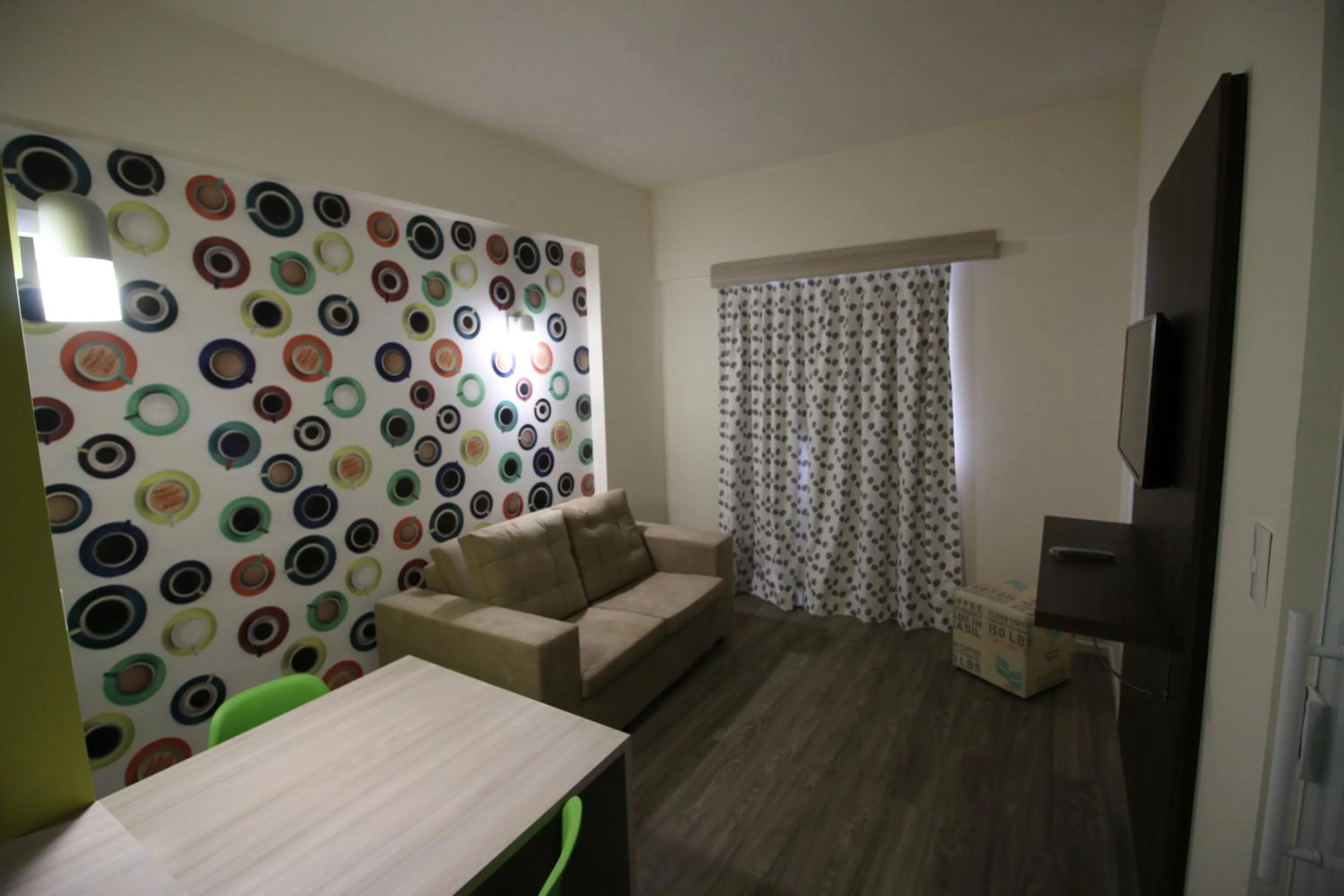 Communal lounge/ TV room, Bed in ibis Styles Vitoria da Conquista