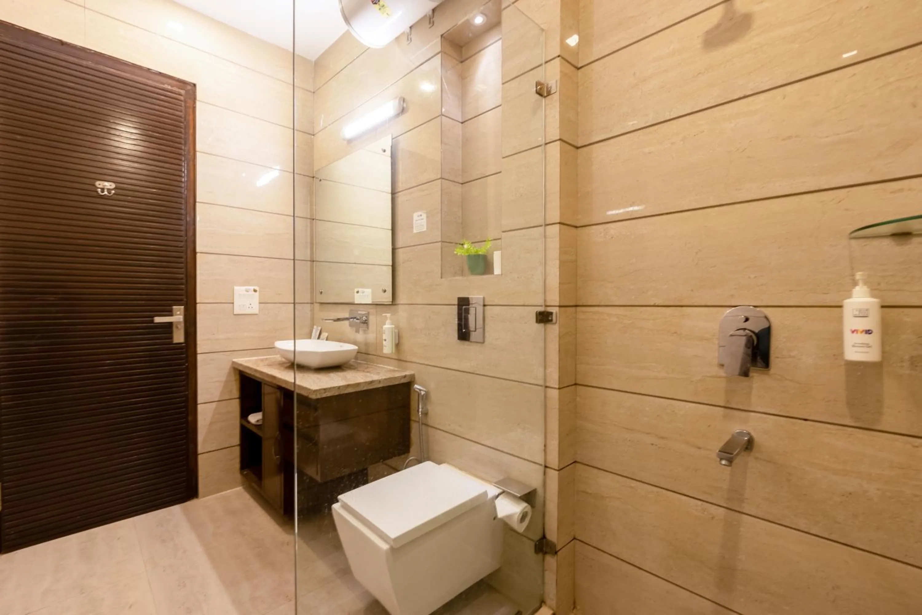 Toilet in Vivid Boutique Hotel, Medanta, Gurugram