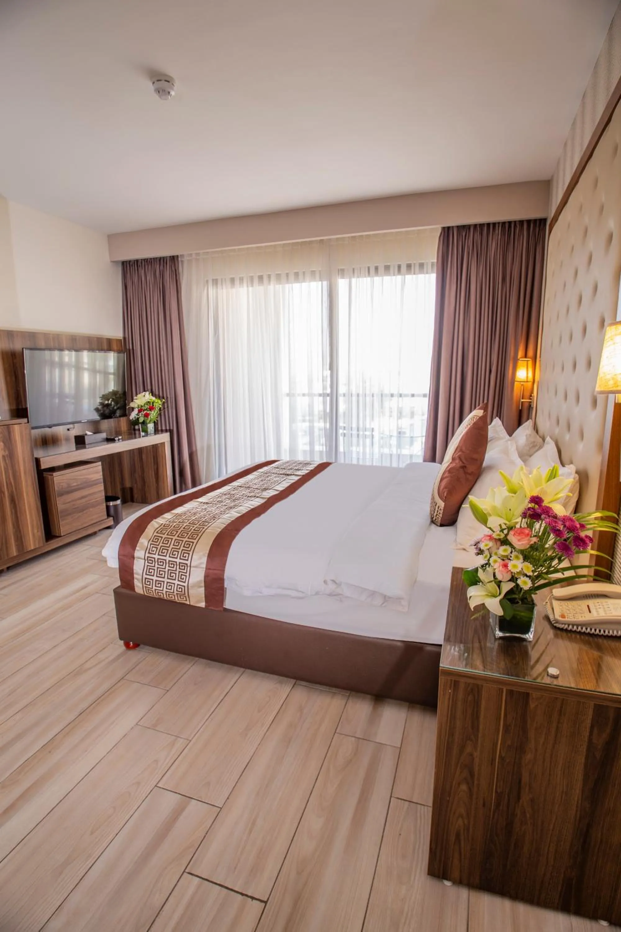 Bed in Lacosta Hotel