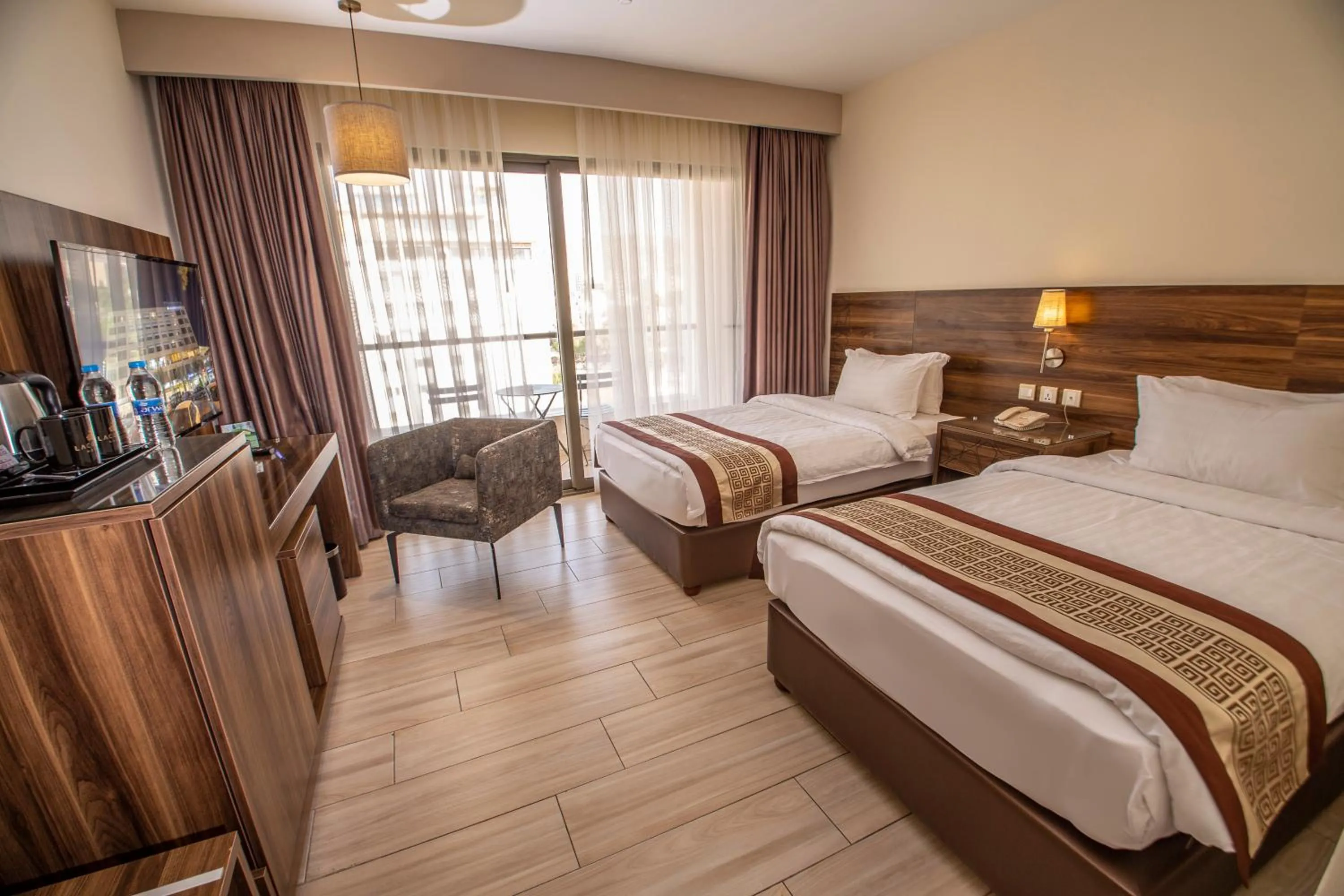 Bed in Lacosta Hotel