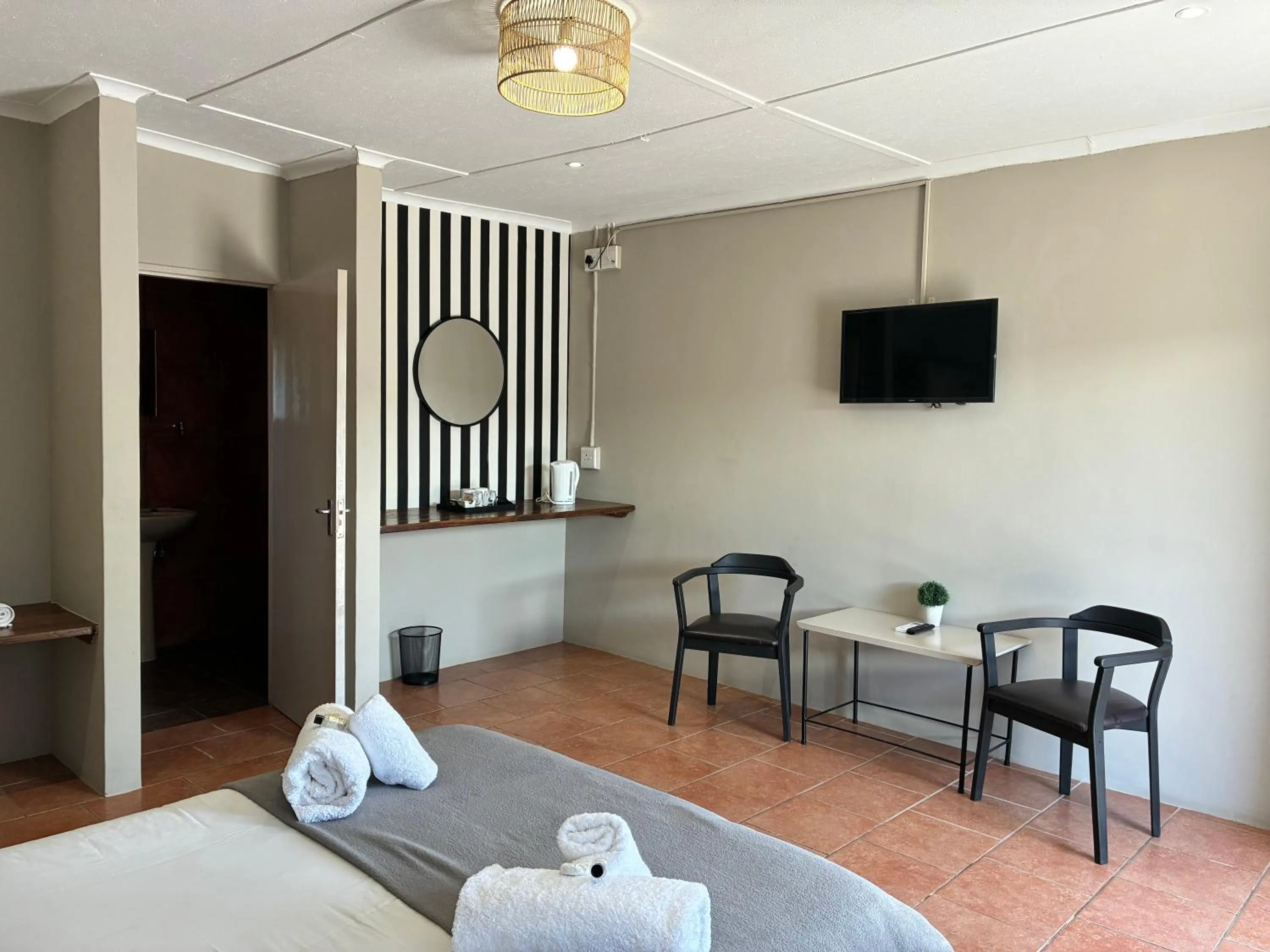 Photo of the whole room, Bed in Mariental Hotel Cc