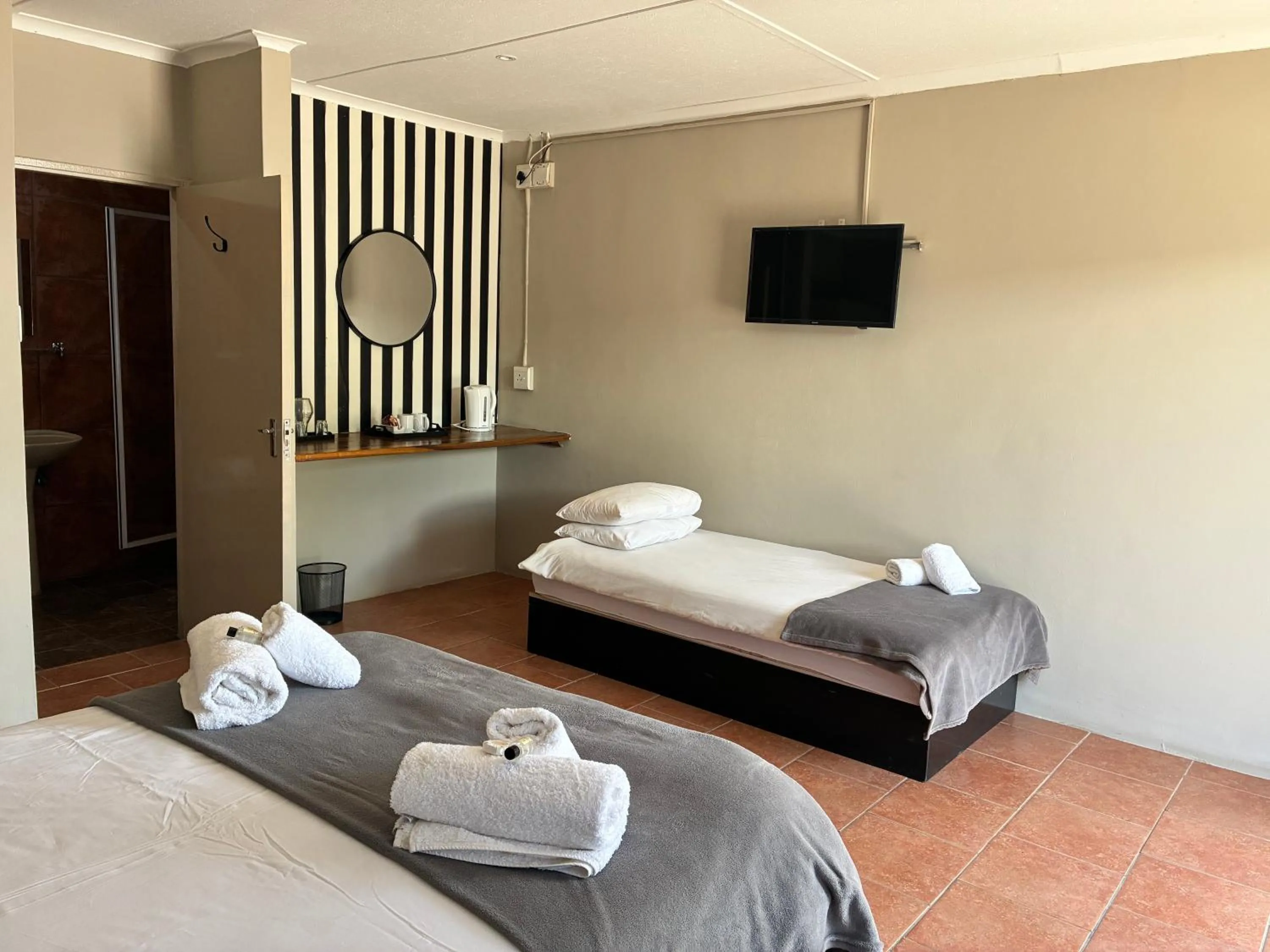 Photo of the whole room, Bed in Mariental Hotel Cc
