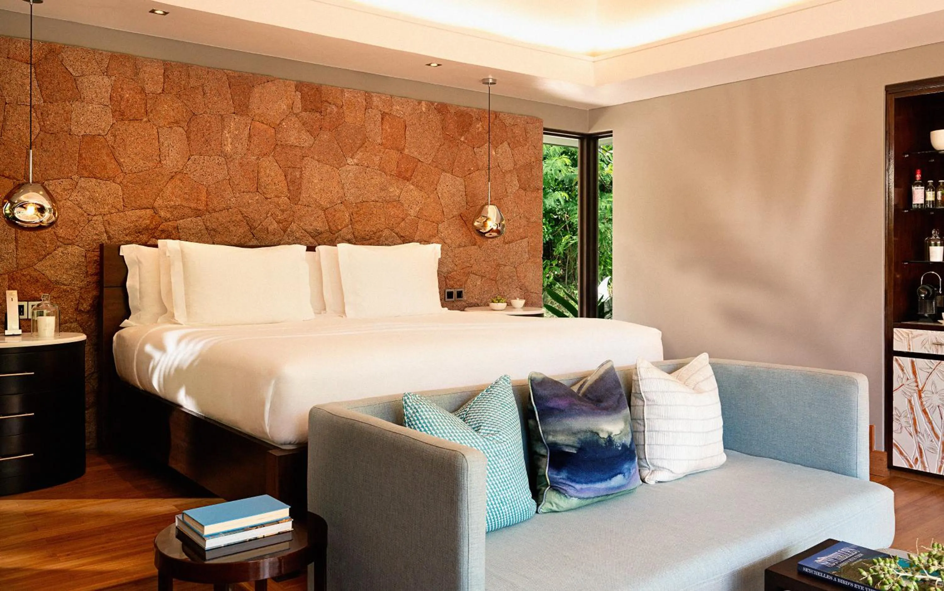 Photo of the whole room, Bed in Raffles Seychelles