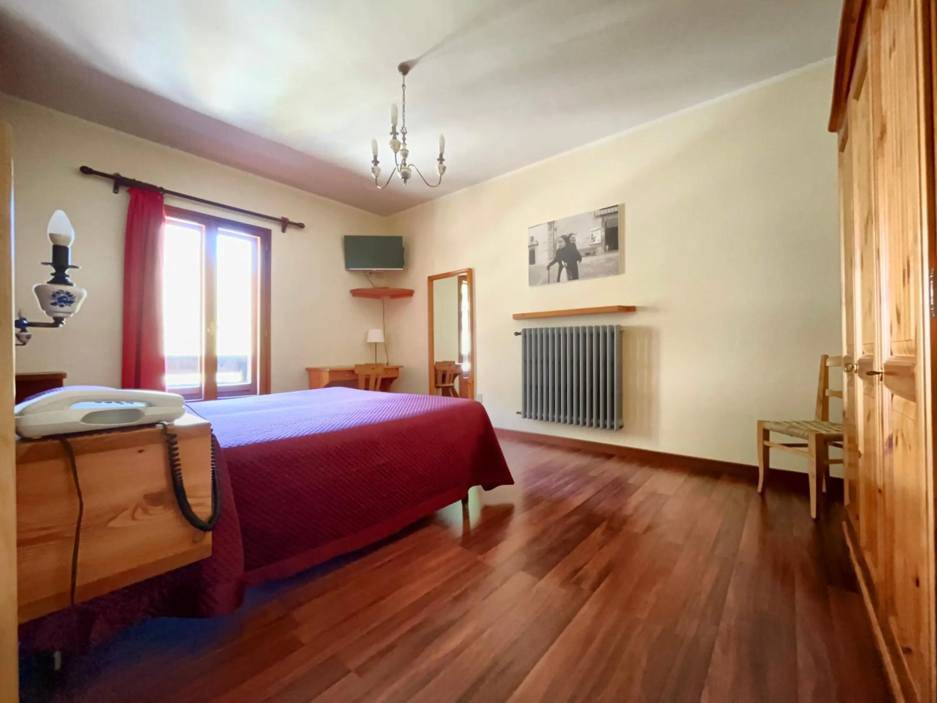 Bed in Hotel Garnì Mille Pini