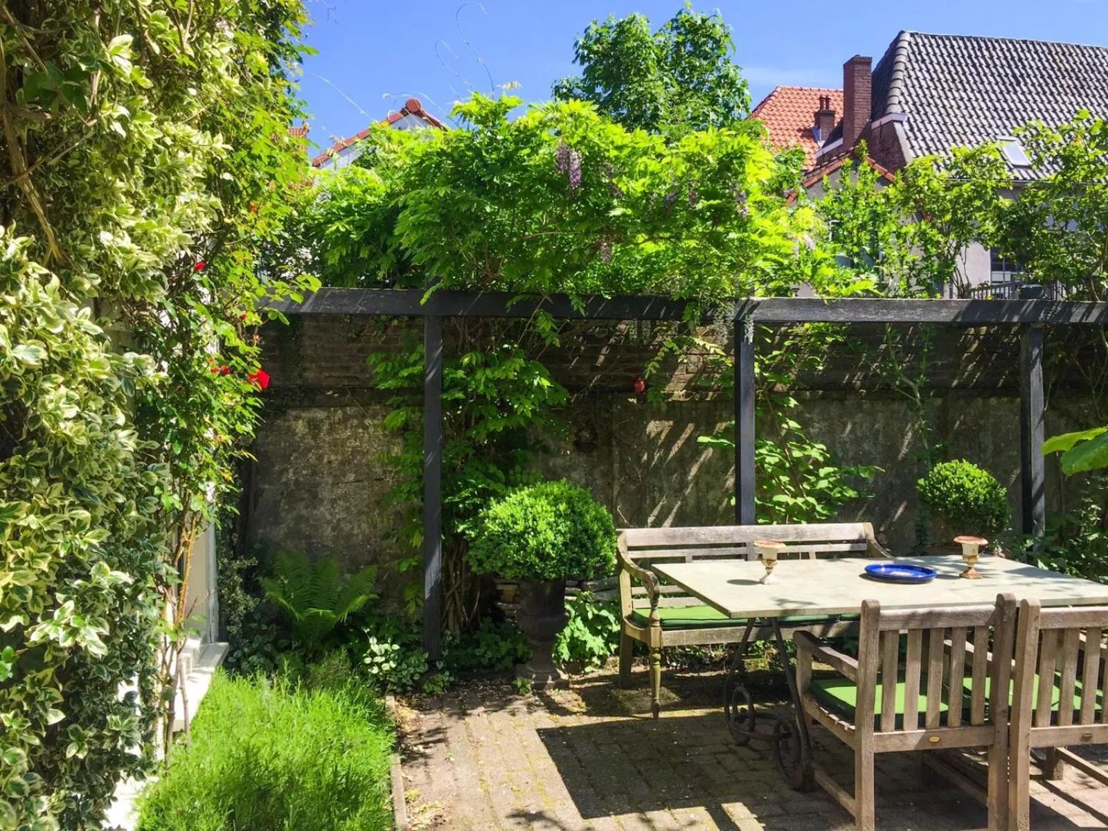Patio in Apple Tree Cottage - charming home at beautiful canal in our idyllic garden