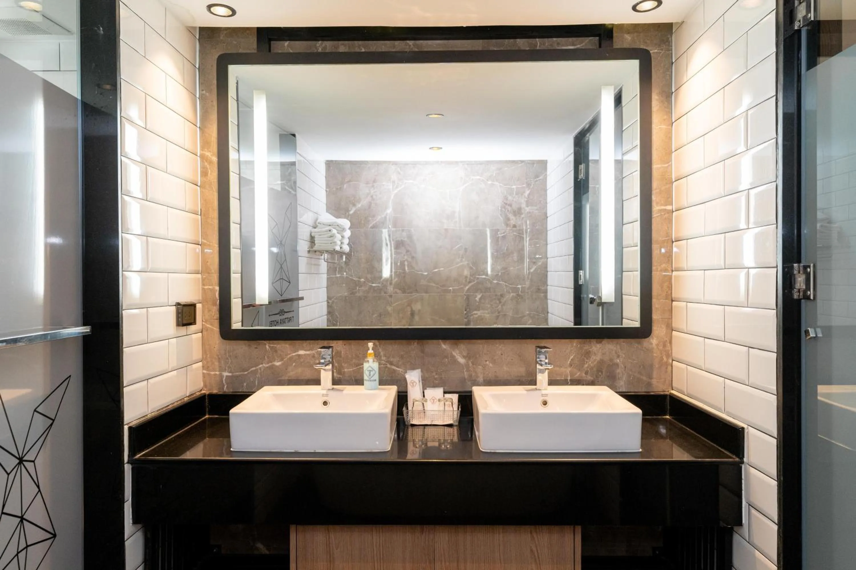 Bathroom in SureStay Plus by Best Western T Pattaya