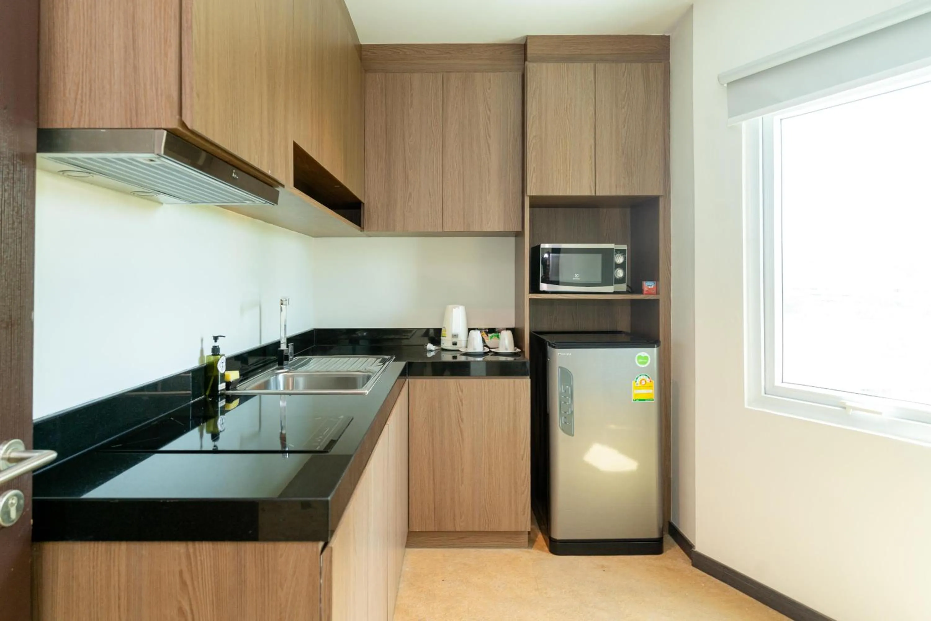 Photo of the whole room in SureStay Plus by Best Western T Pattaya